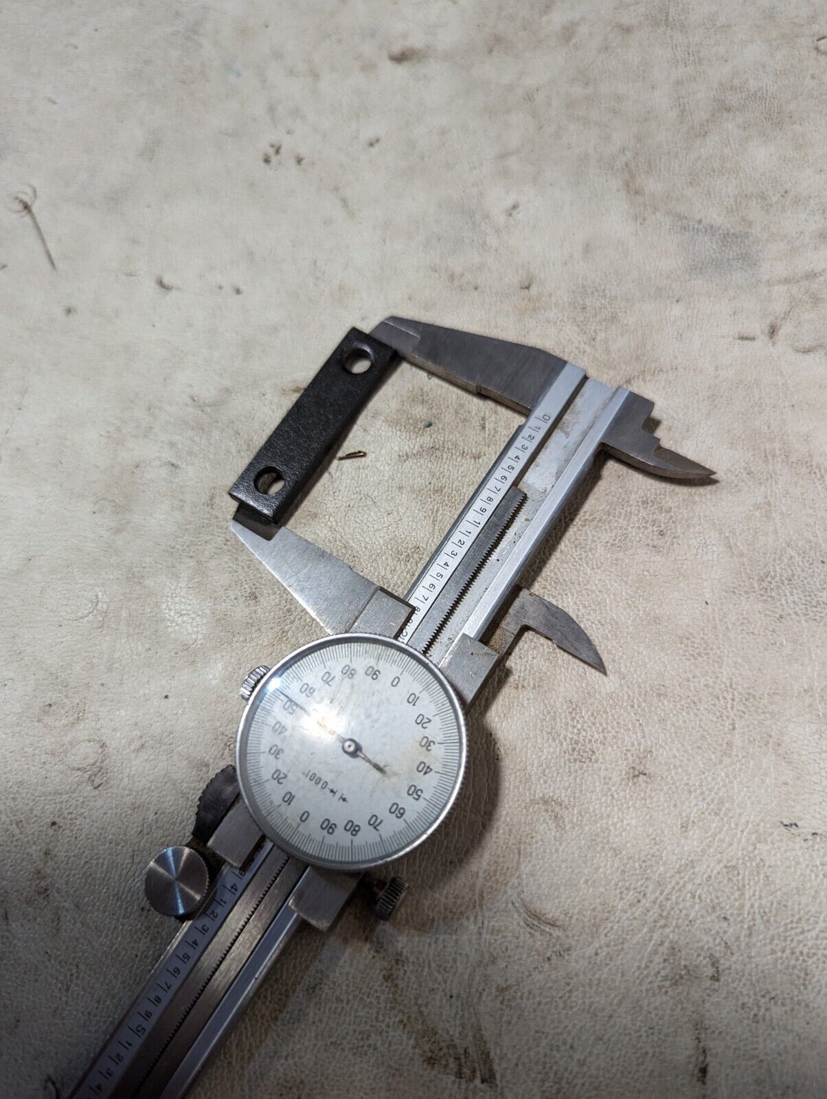 6.5+ pounds of flat metal bracket plates as pictured, 0.19 inches thick...