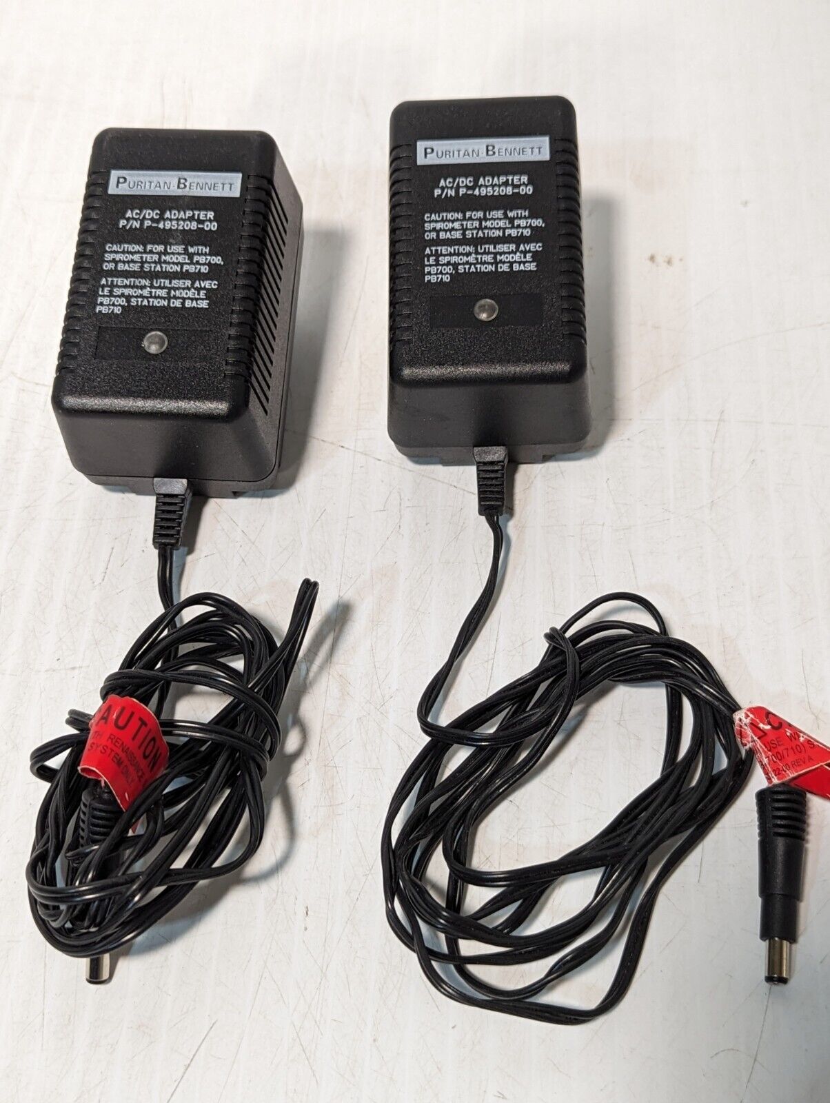 Lot of 2 Puritan Bennett P-495208-00 power adapters, 12VDC@400mA out
