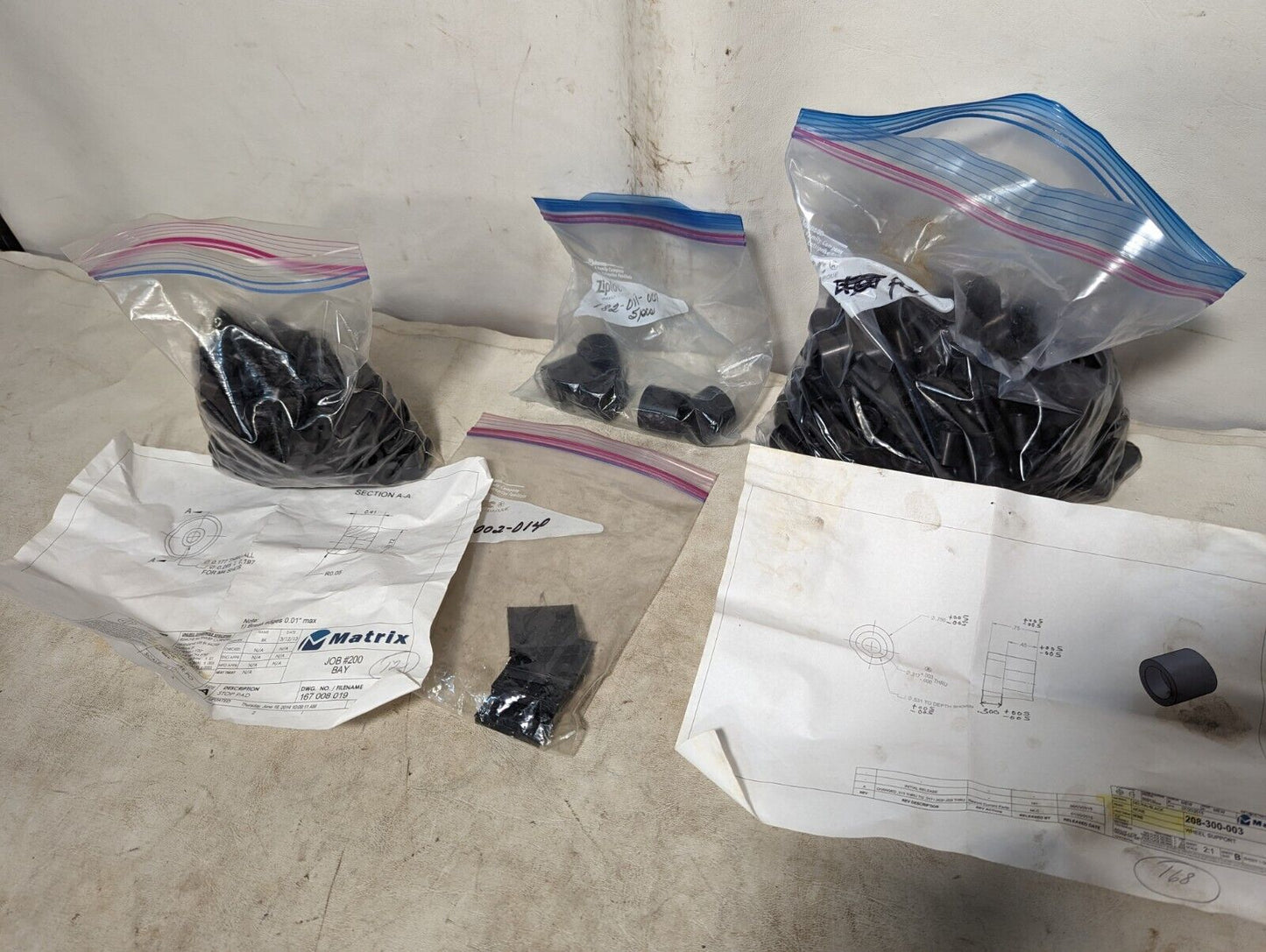 4.5+ pounds of black Delrin hardware as pictured