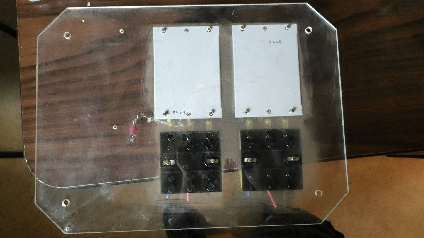 Two TimeMark B264 3-Phase Power Monitors mounted on plastic