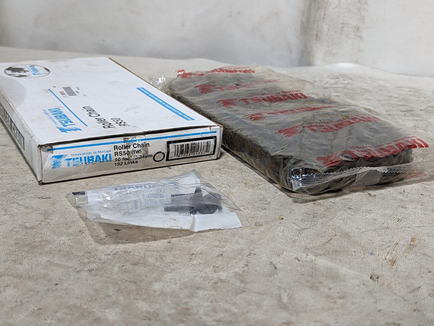 Two boxes of Tsubaki RS50 roller chain, 10 ft: one new old stock, one partial