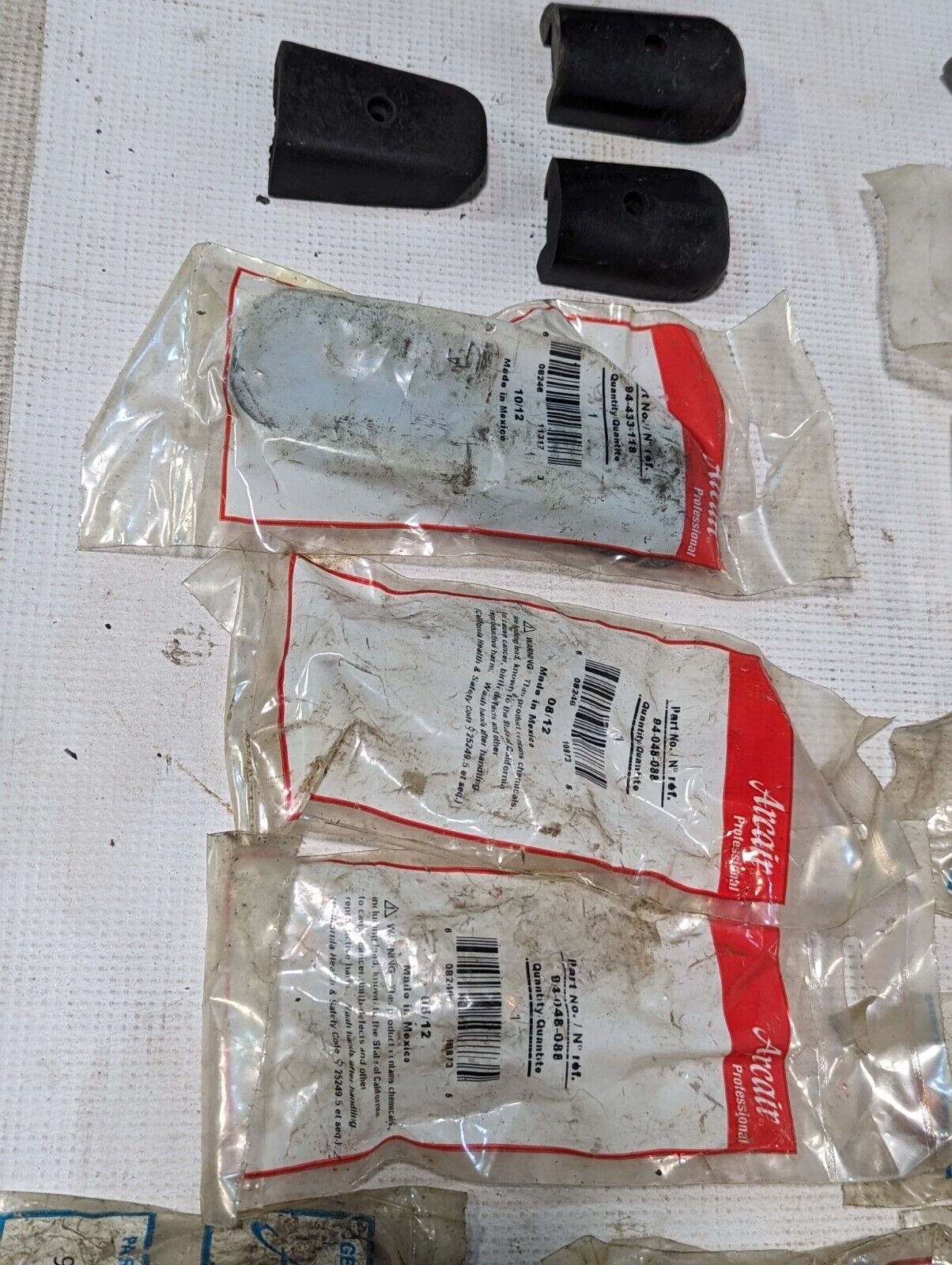 Large lot of Arcair welding parts as pictured: 94103114, 94433118, 94048087....