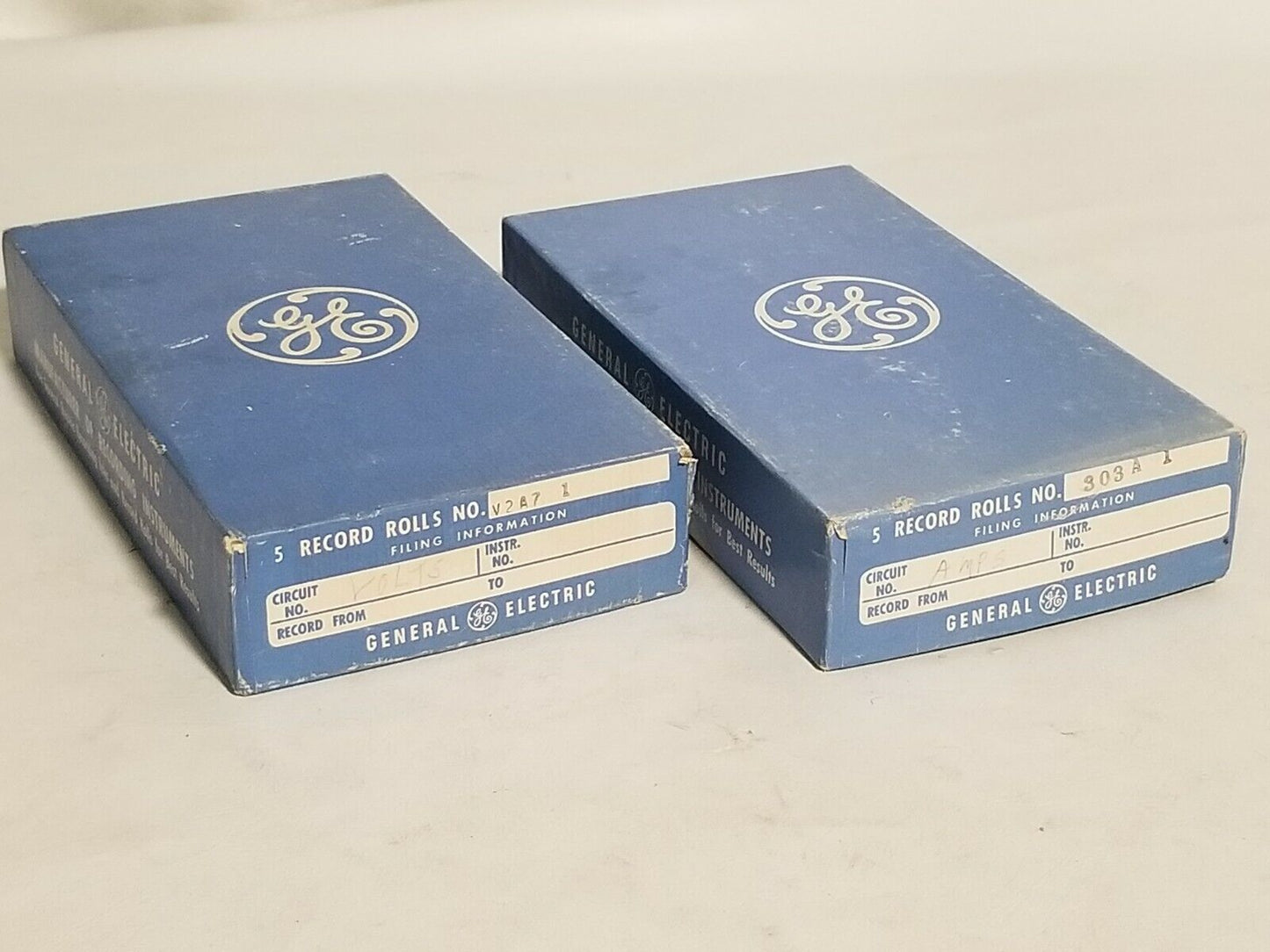 2 boxes of GE record rolls V2A71 (volts) and 303A1 (amps), 5 rolls per box