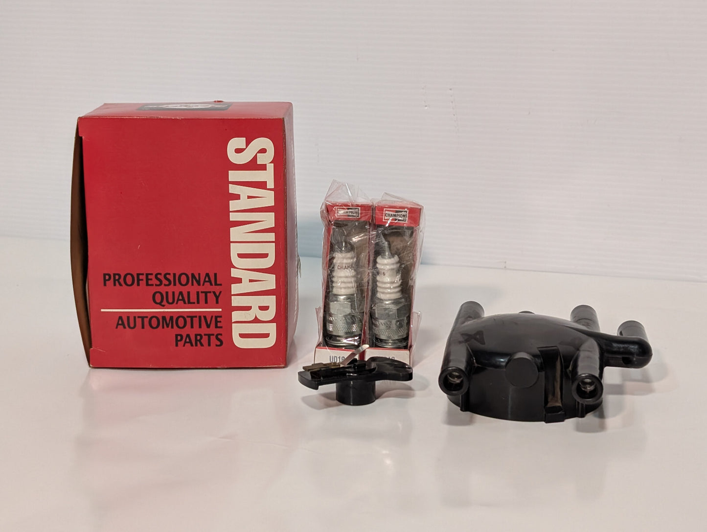 Standard Automotive Parts AL-147 Distributor Cap, (2) Champion UD16 Spark Plugs