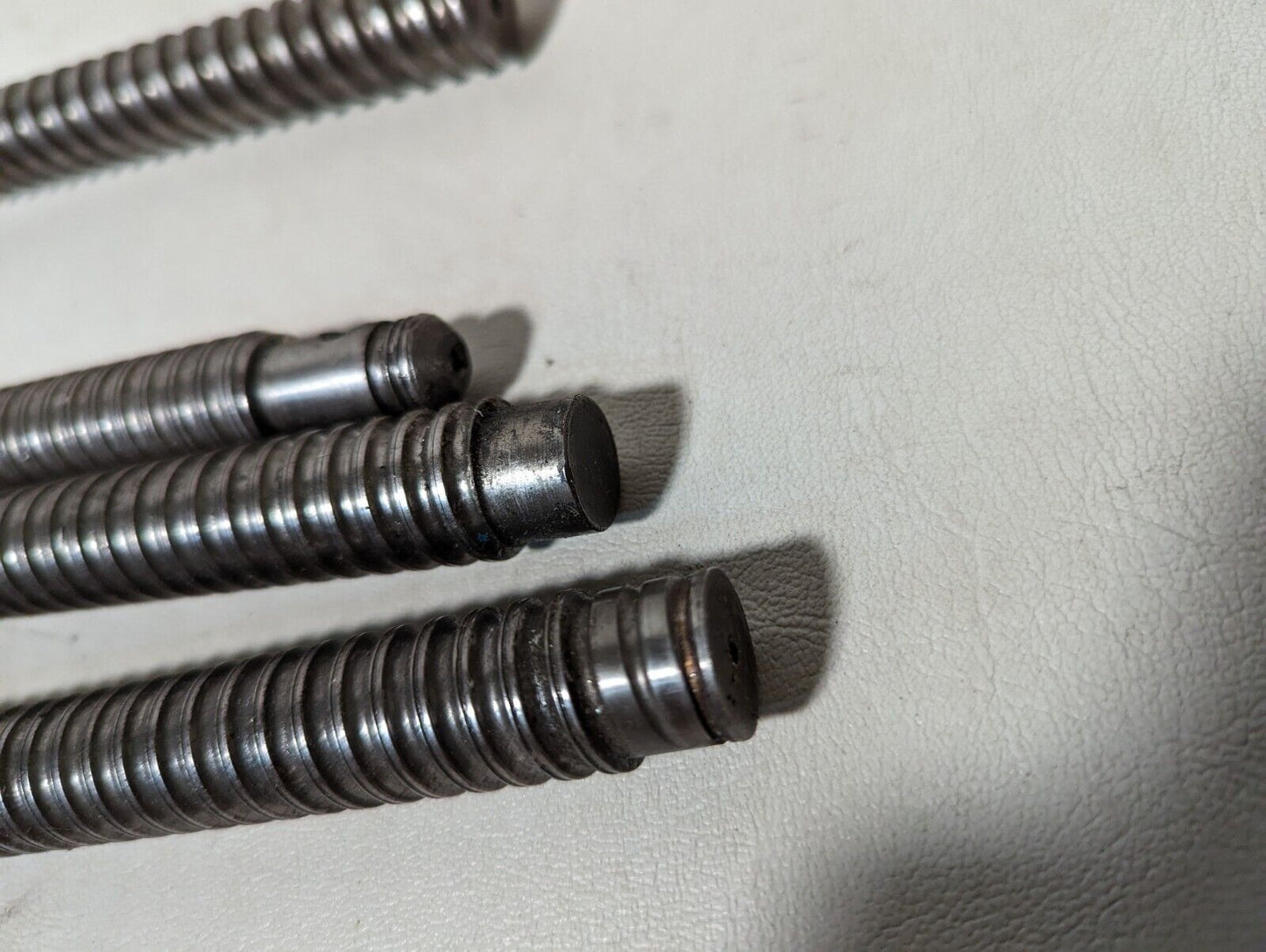 Lot of 4 feed screws, 3x 32 inches, 1x 36 inches long, plus some extras