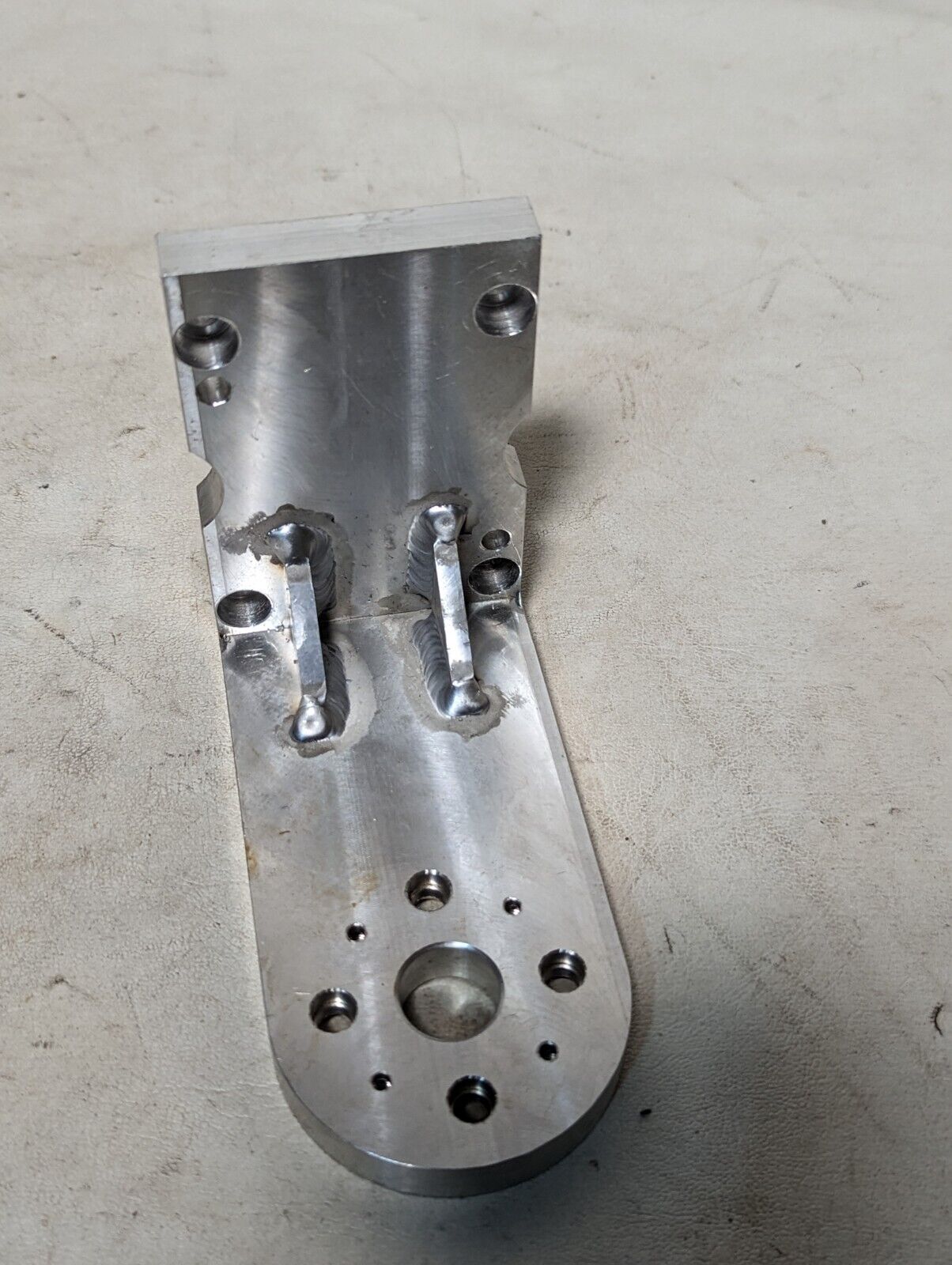 Aluminum right angle bracket, 5 in long, 4 in deep, 2.5 in wide, 0.5 in thick