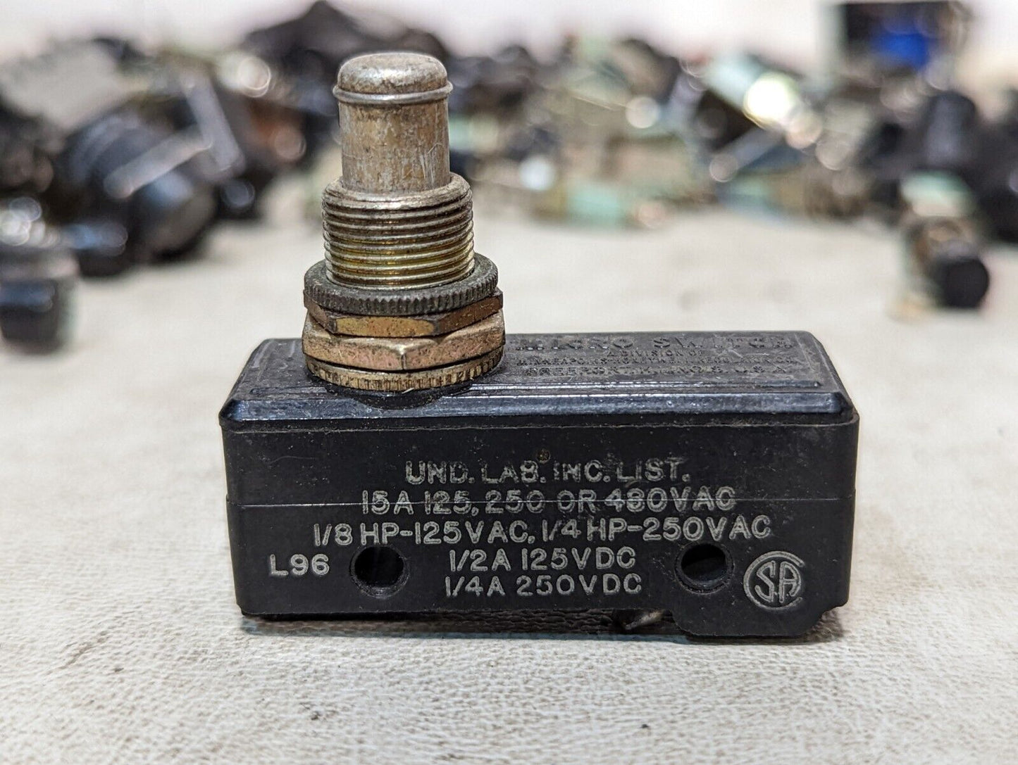 Lot of fuse holders, Micro Switch limit switches, small buttons, and relays