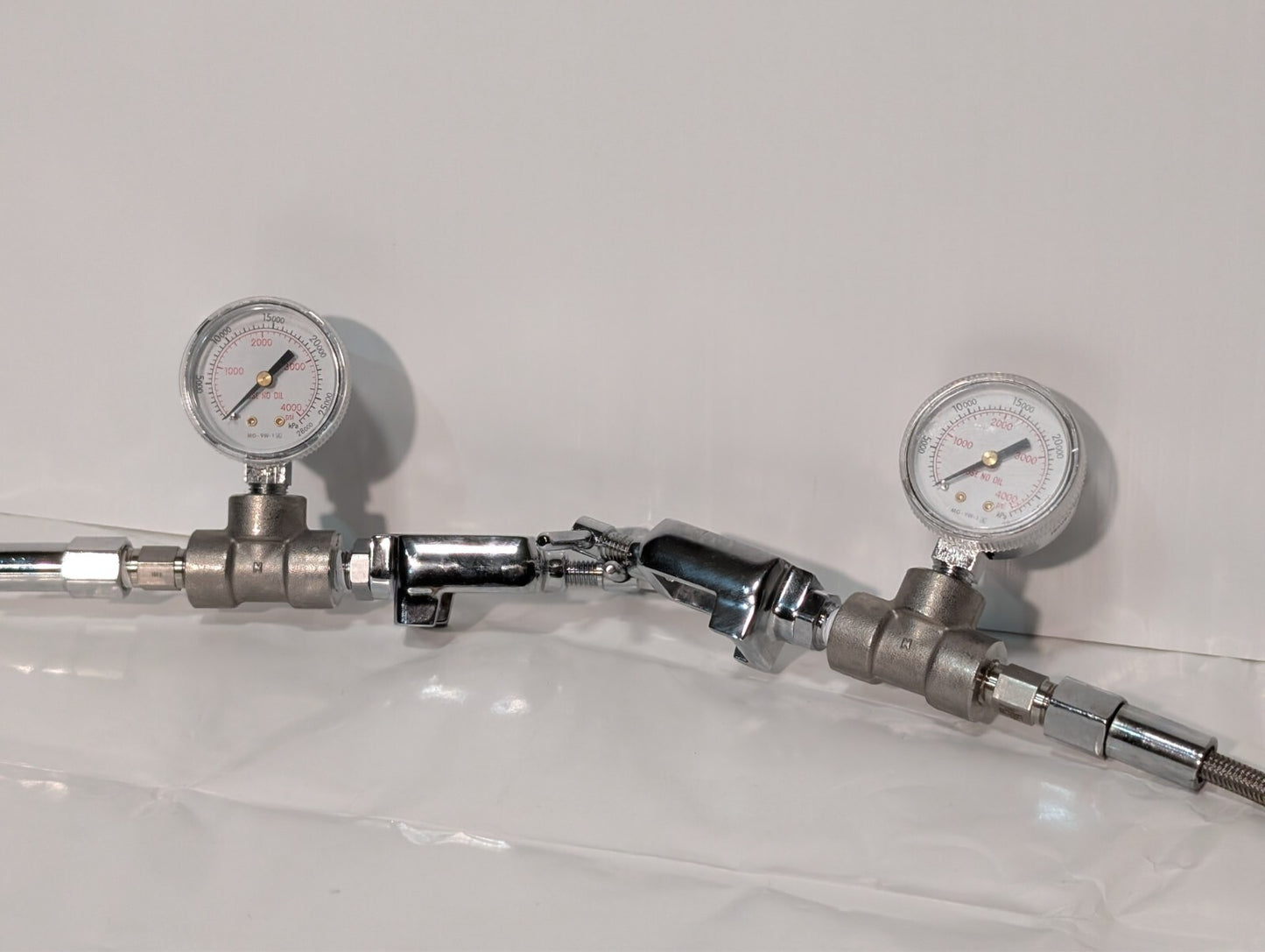 2 Western Medical MG-9W-1 Pressure Gauges on Metal Gas Pipe Cable