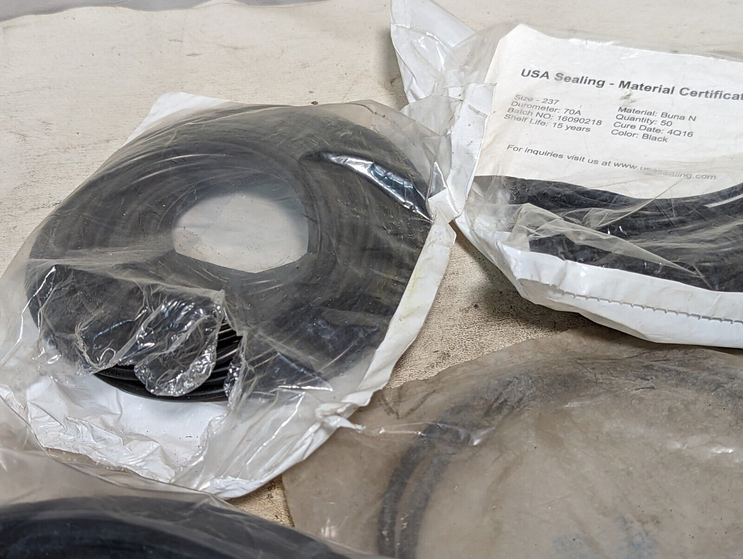 Lot of rubber, Buna N O-rings, rubber straps, and a rubbery cylinder...