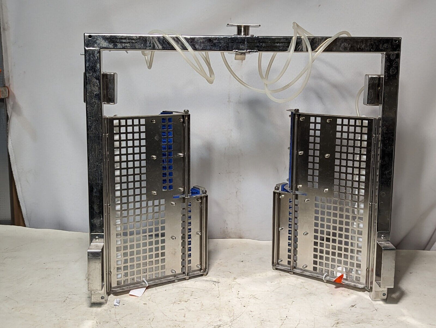 Unknown, unbranded item: maybe lab dishwasher rack, maybe X-ray cassette related