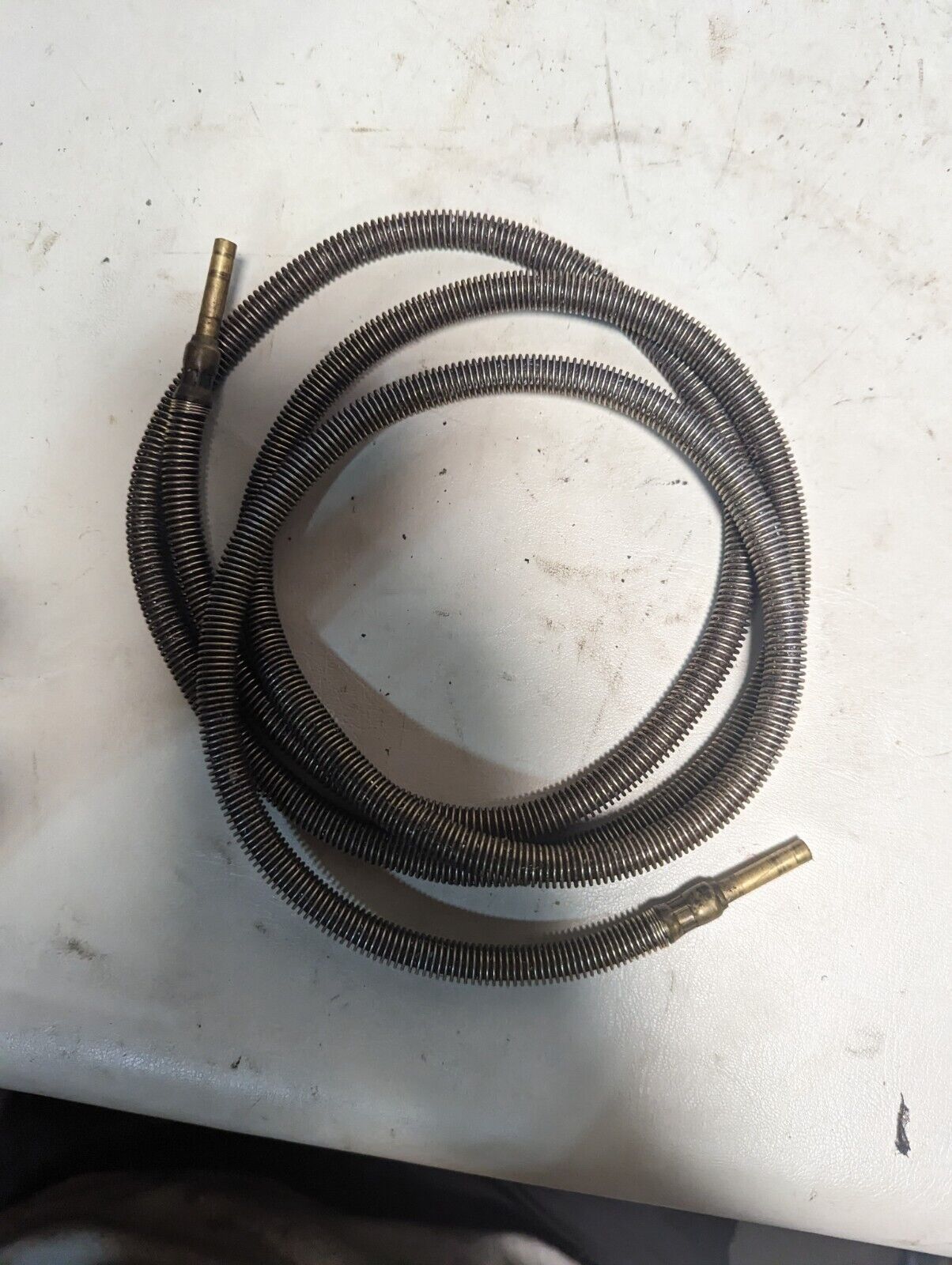 Lot of assorted Showa lubricating parts: two hoses, PB-6M, springs, PD-6M
