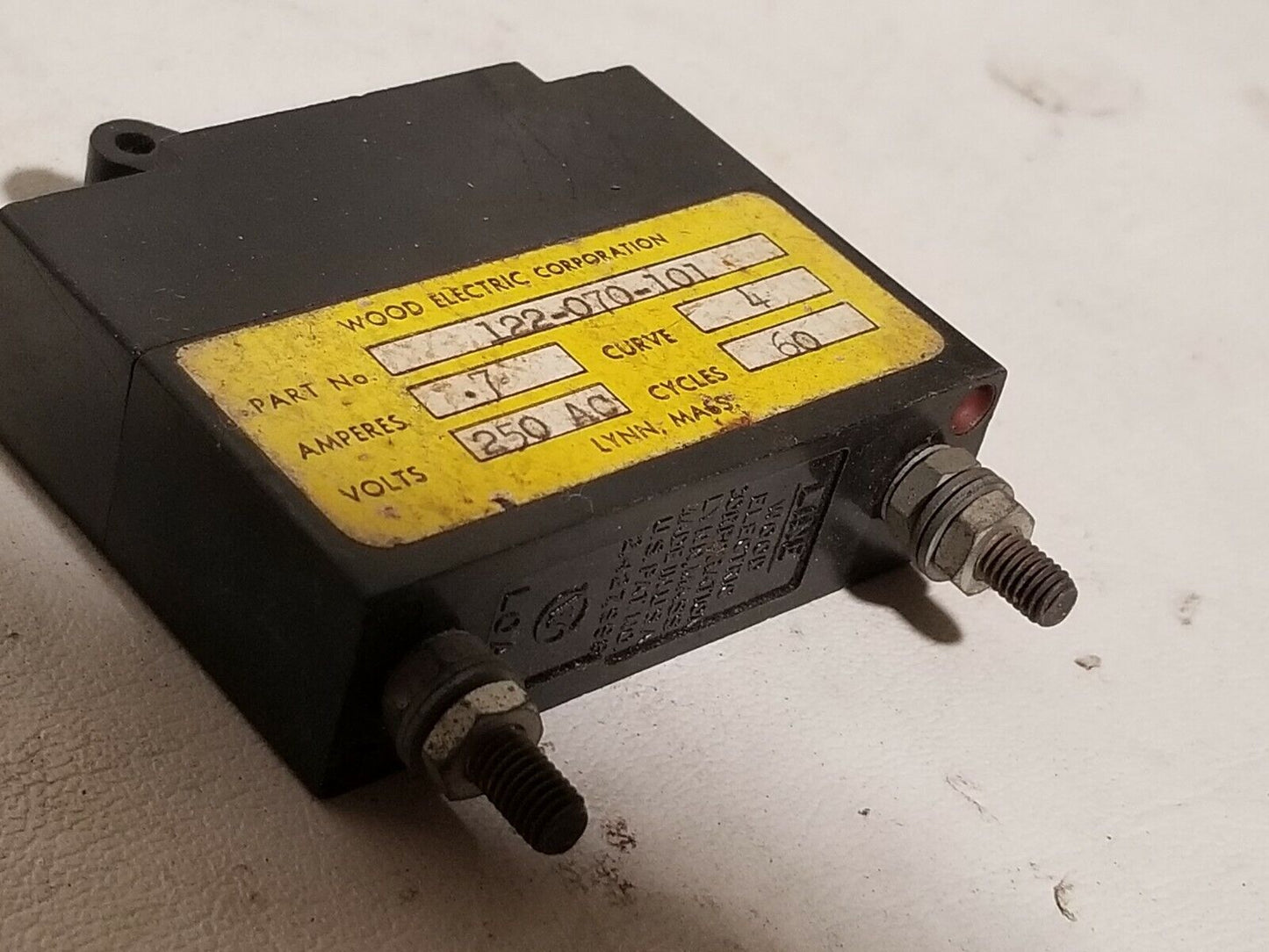 Wood Electric 122-070-101 circuit breaker, 0.7A, 250VAC, 60Hz, curve 4, 1 pole