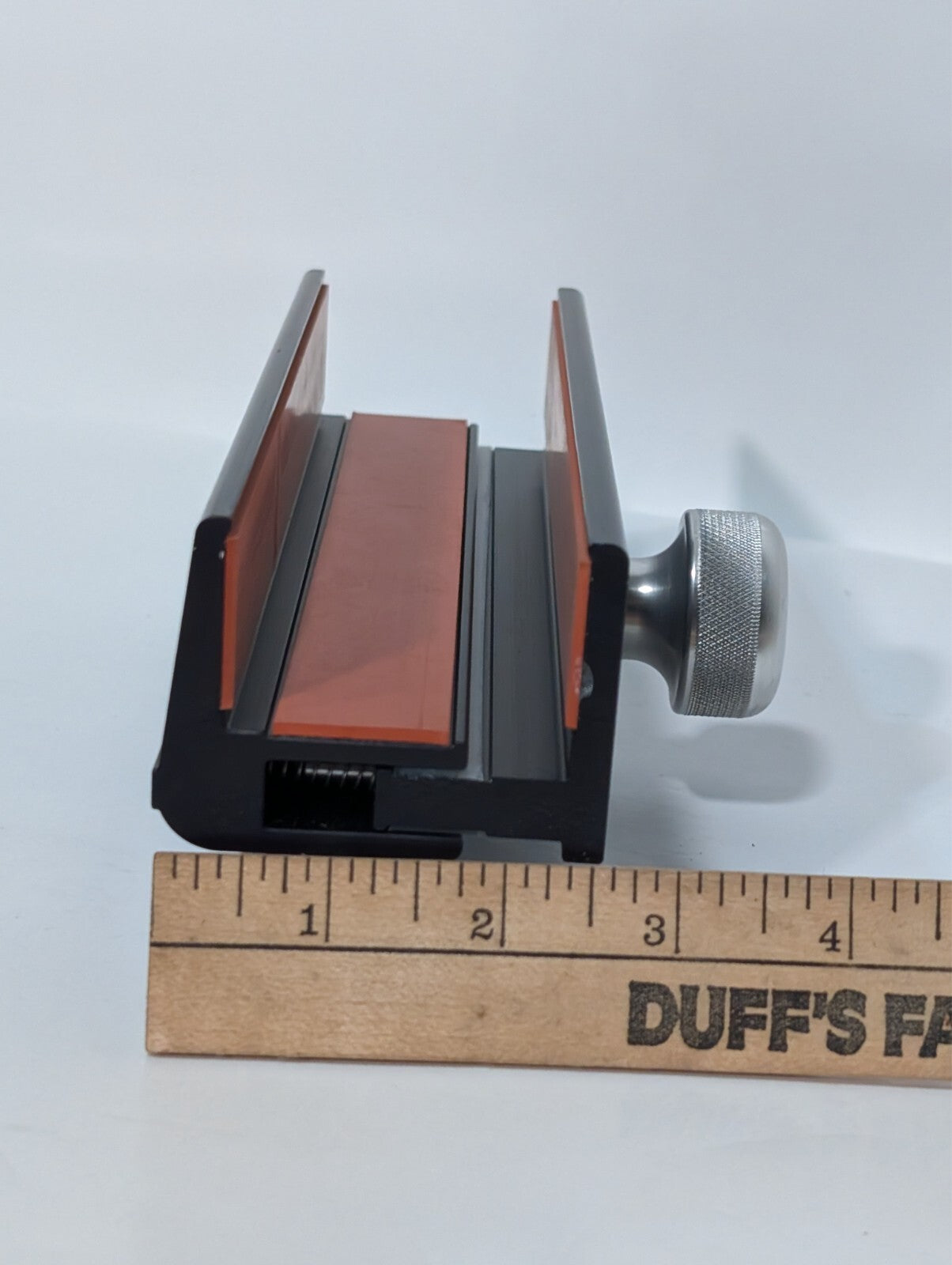 Unbranded clamp, 25 pounds max load, 8 in long, 1-1/4 to 1-13/16 inches thick