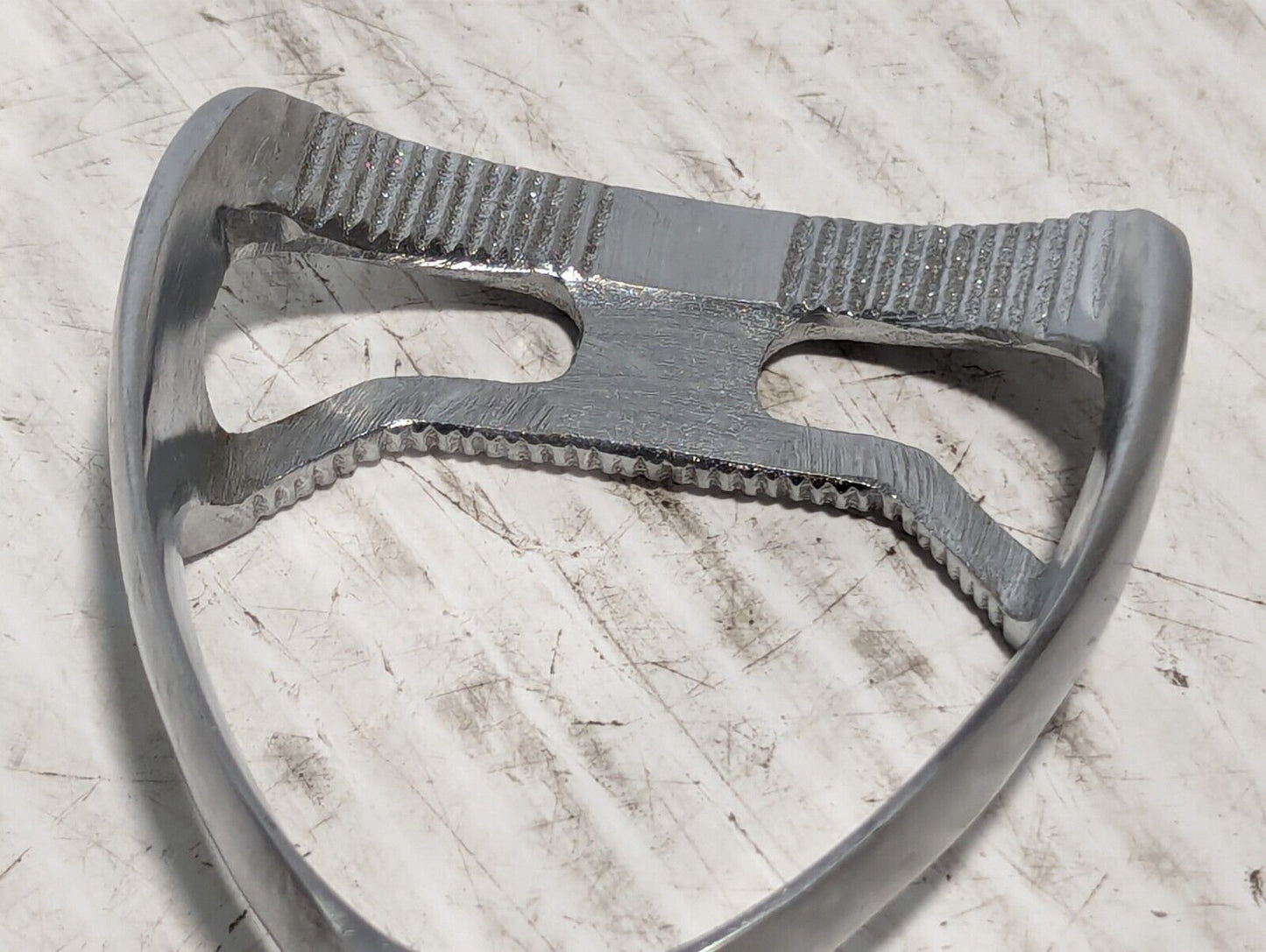 Unbranded stirrup foot rest as pictured, stainless steel, w/cross-hatched grip