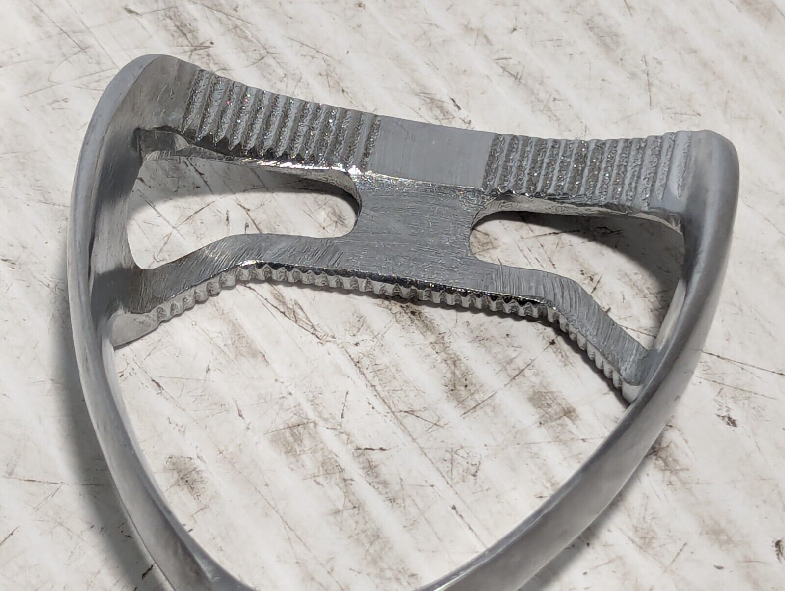 Unbranded stirrup foot rest as pictured, stainless steel, w/cross-hatched grip