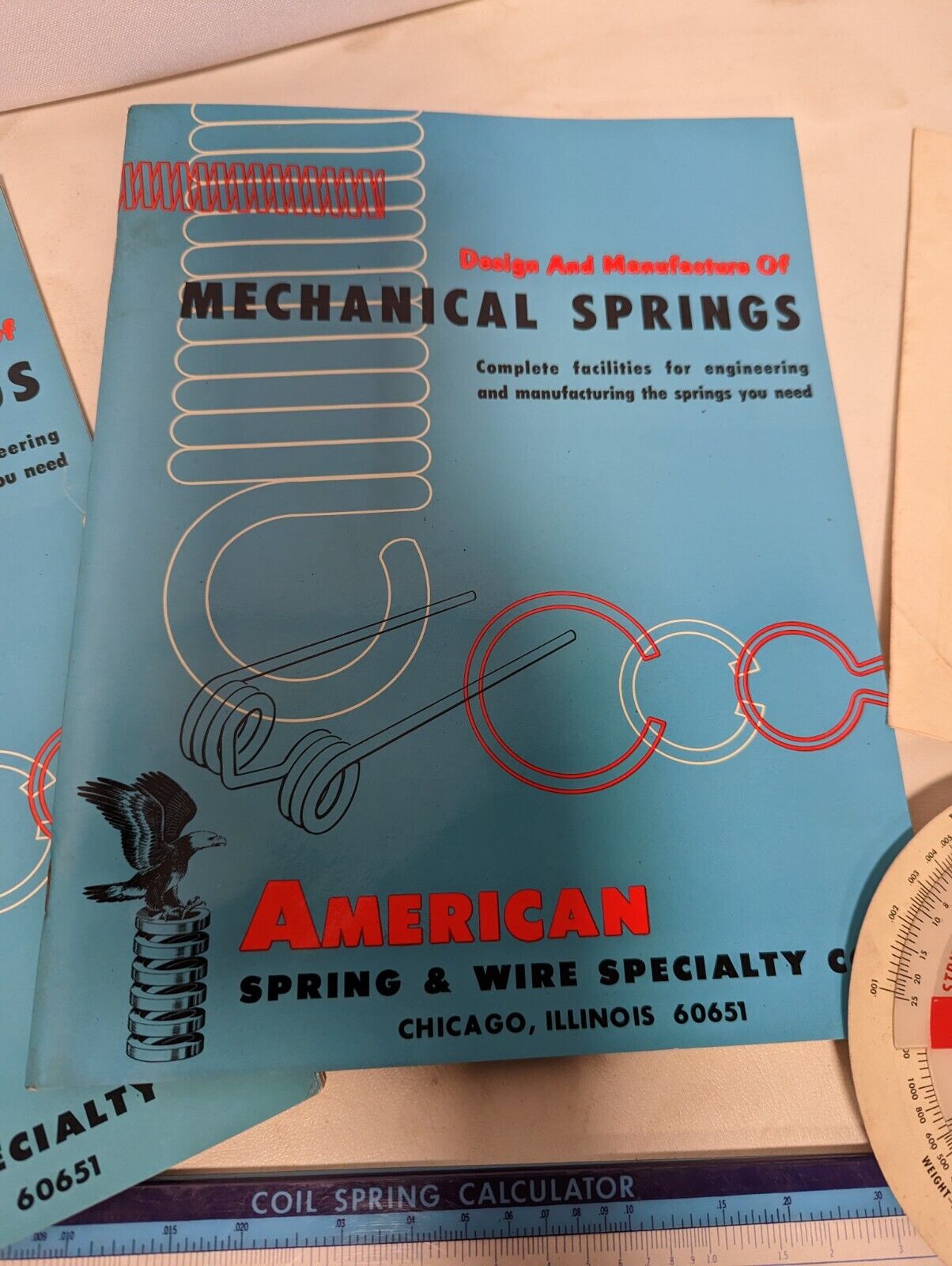 Vintage Chicago-area spring manufacturer paper goods: coil spring calculators...