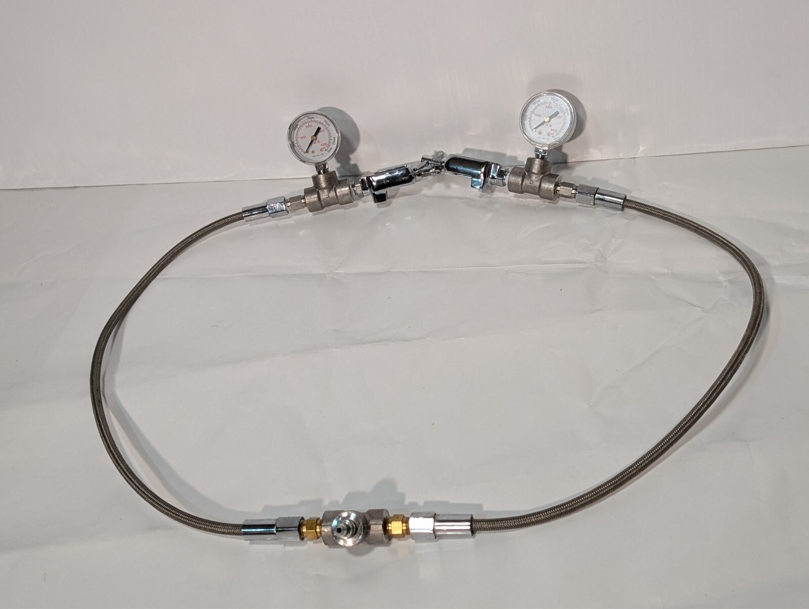 2 Western Medical MG-9W-1 Pressure Gauges on Metal Gas Pipe Cable