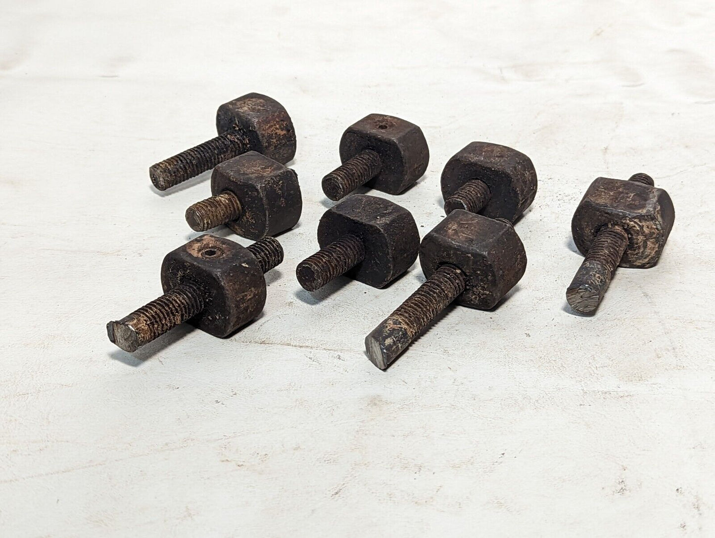 Lot of 8 rusty sawed-off threaded rods with set screw stops as pictured