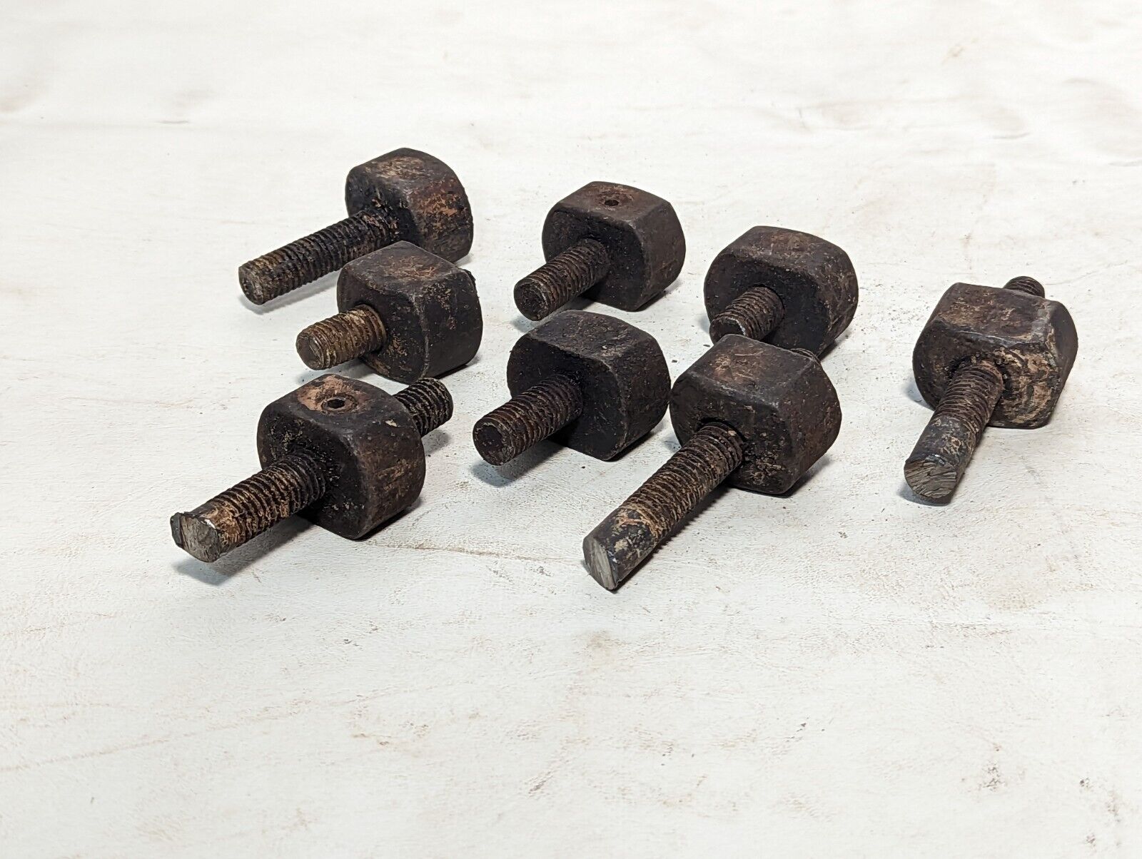 Lot of 8 rusty sawed-off threaded rods with set screw stops as pictured