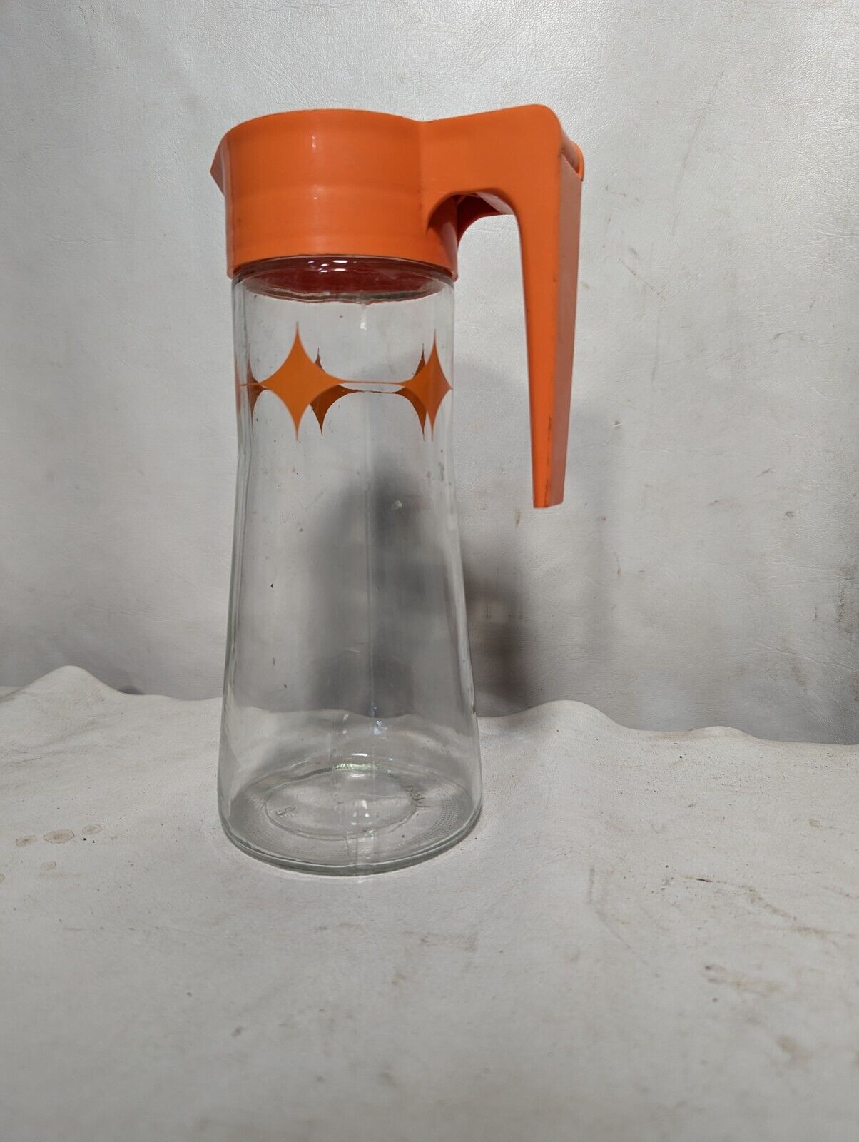 Vintage orange and clear glass pitcher, small