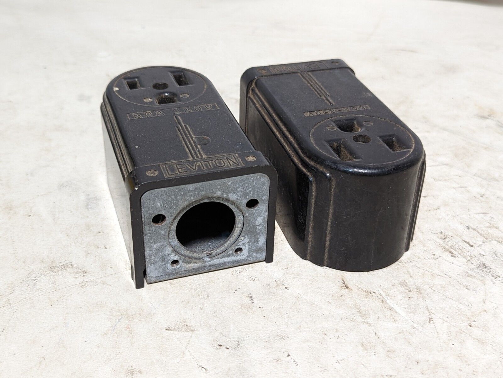 Lot of 2 vintage black Leviton 50A, 250V surface mount receptacles as pictured