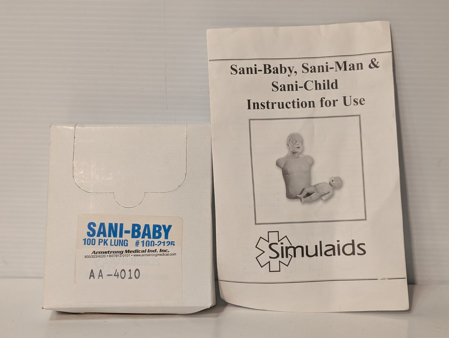 (1) SIMULAIDS SANI-Child CPR Child Training Manikin w/ 100 Pack Lungs as shown