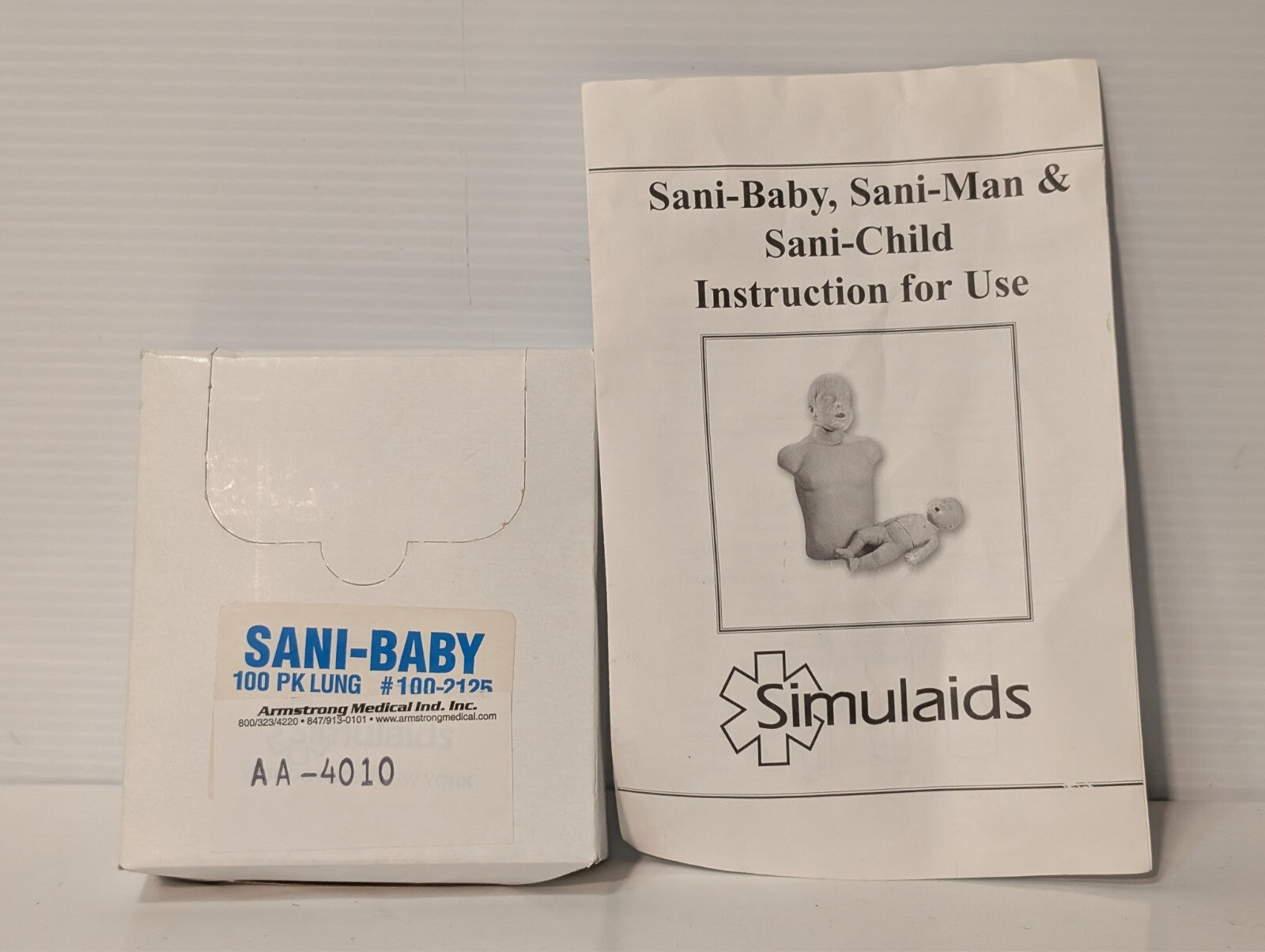 (1) SIMULAIDS SANI-Child CPR Child Training Manikin w/ 100 Pack Lungs as shown