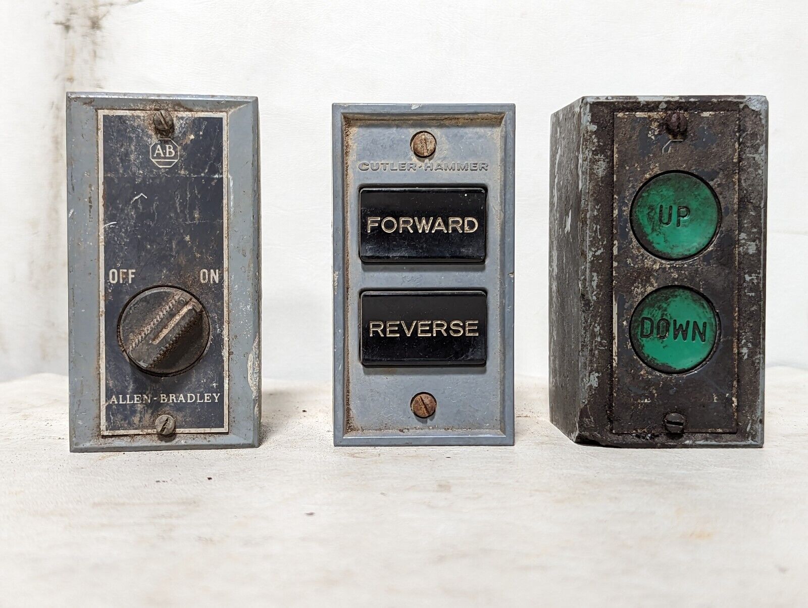 Lot of three controllers in enclosures: Allen-Bradley selector, Cutler-Hammer...