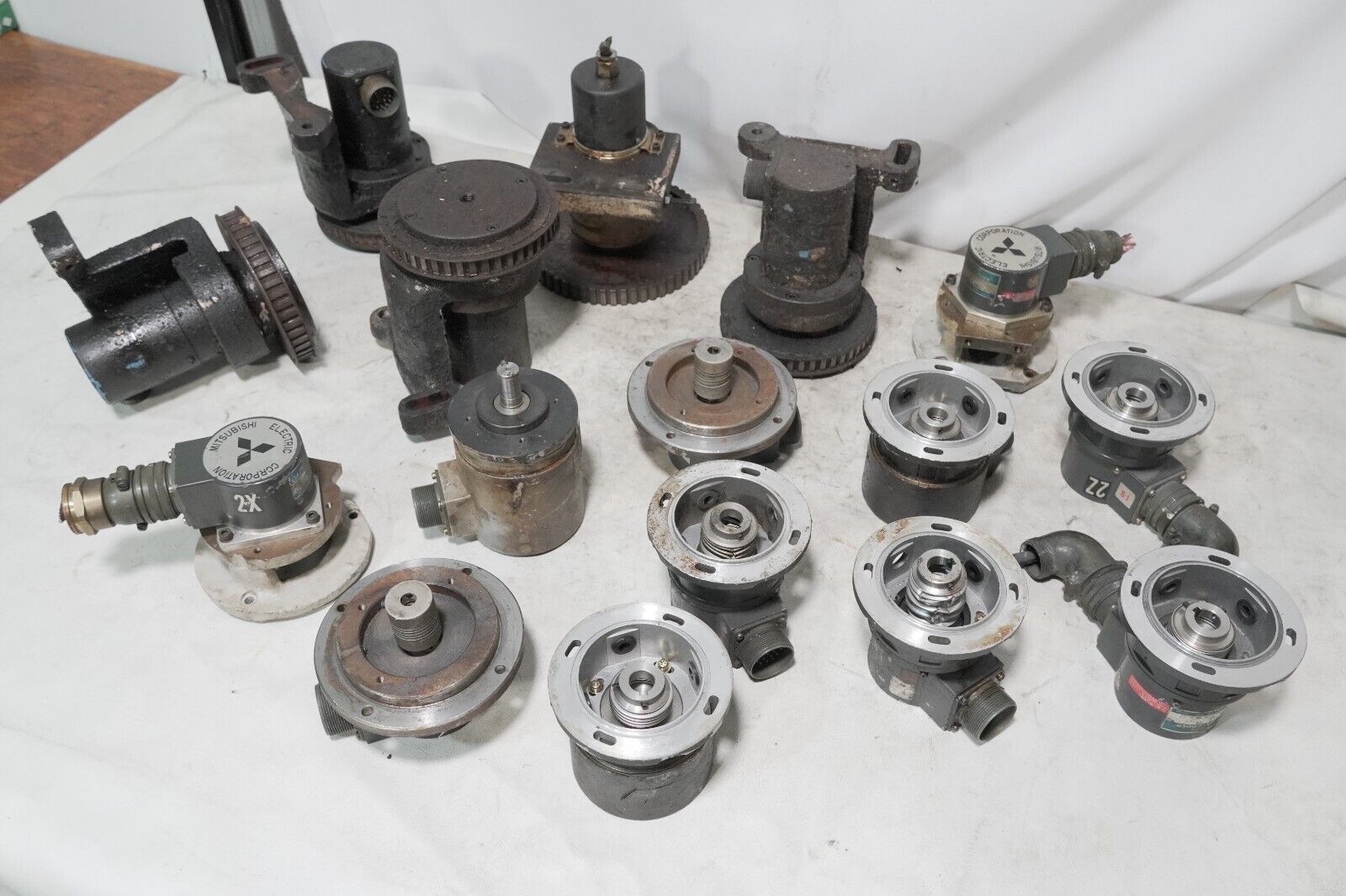 Lot of 16 rotary encoders: mostly Mitsubishi, Tamagawa OSE-5KN-6-12-108