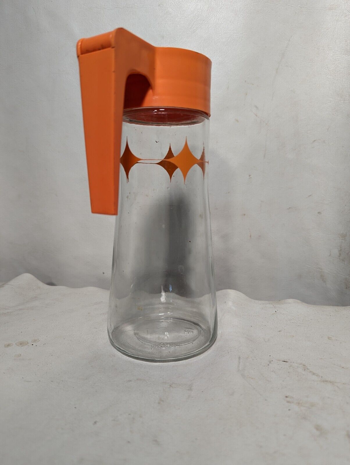 Vintage orange and clear glass pitcher, small