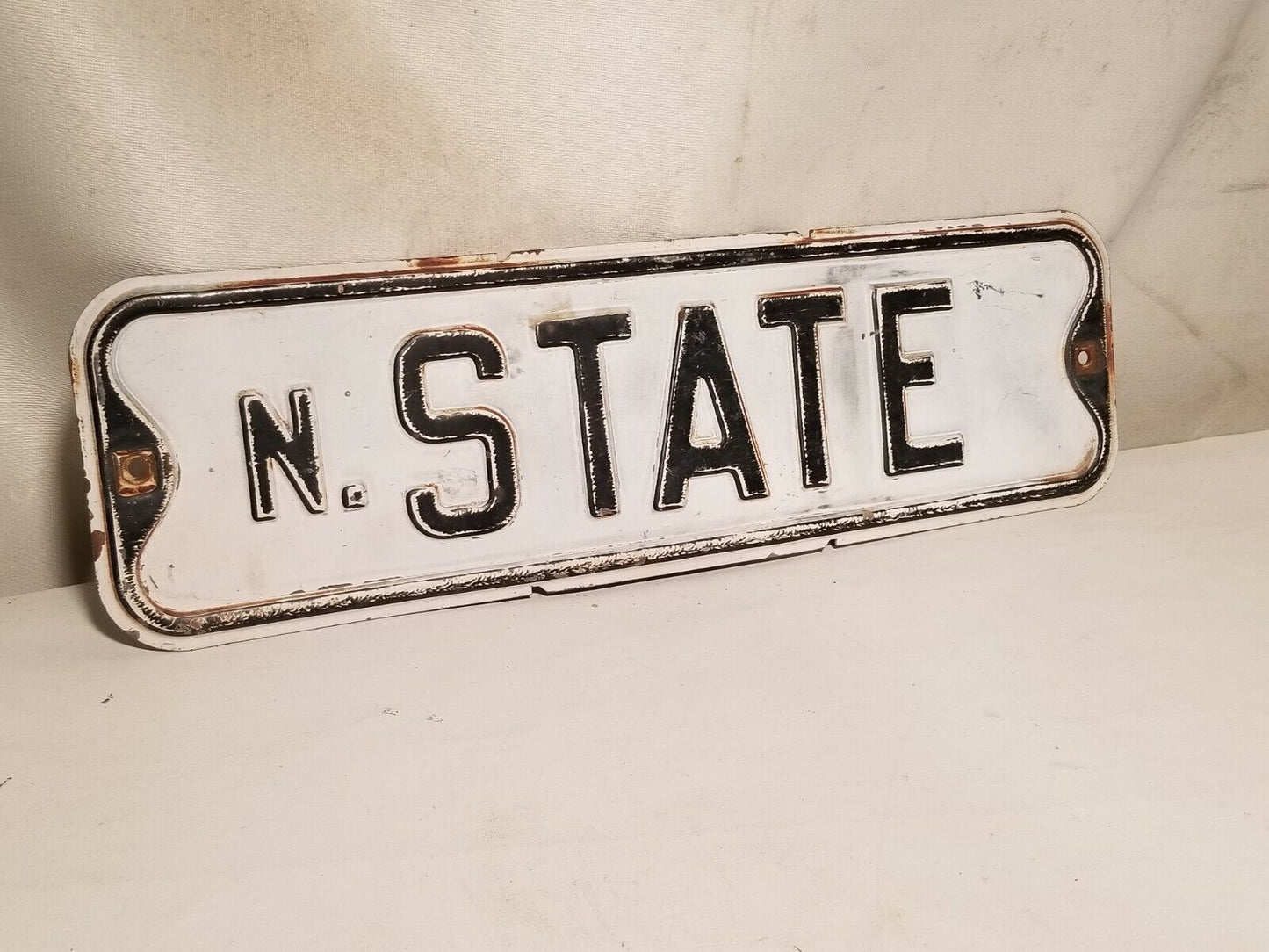 State Street Sign, North State, black and white, some rust, embossed