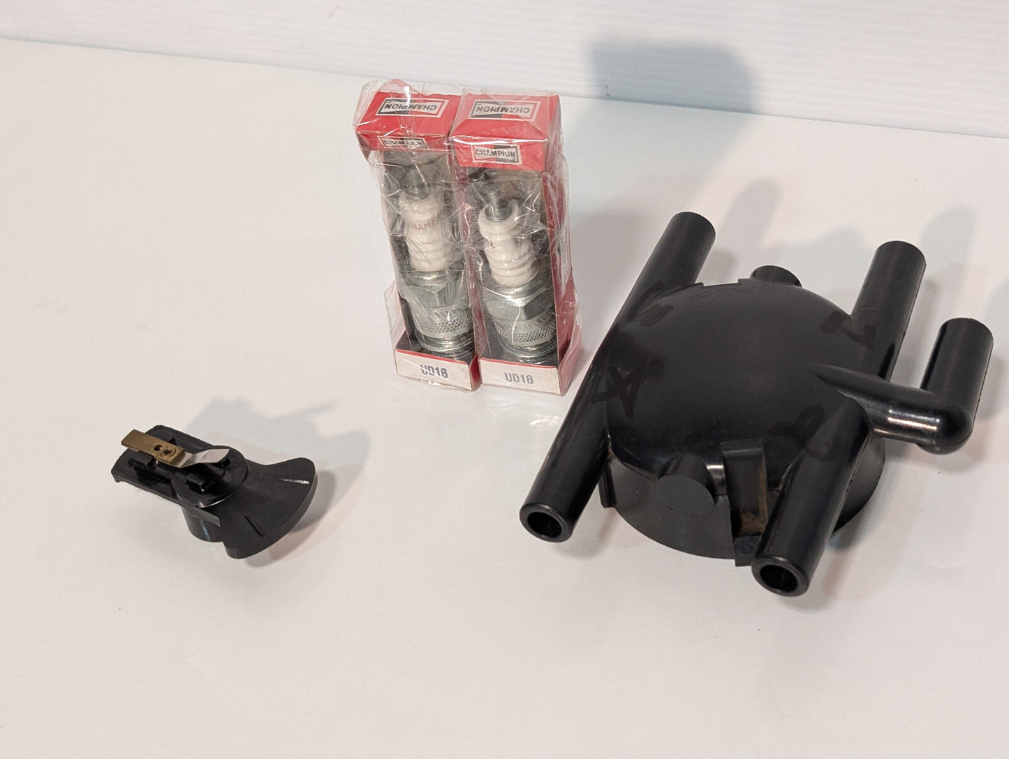 Standard Automotive Parts AL-147 Distributor Cap, (2) Champion UD16 Spark Plugs