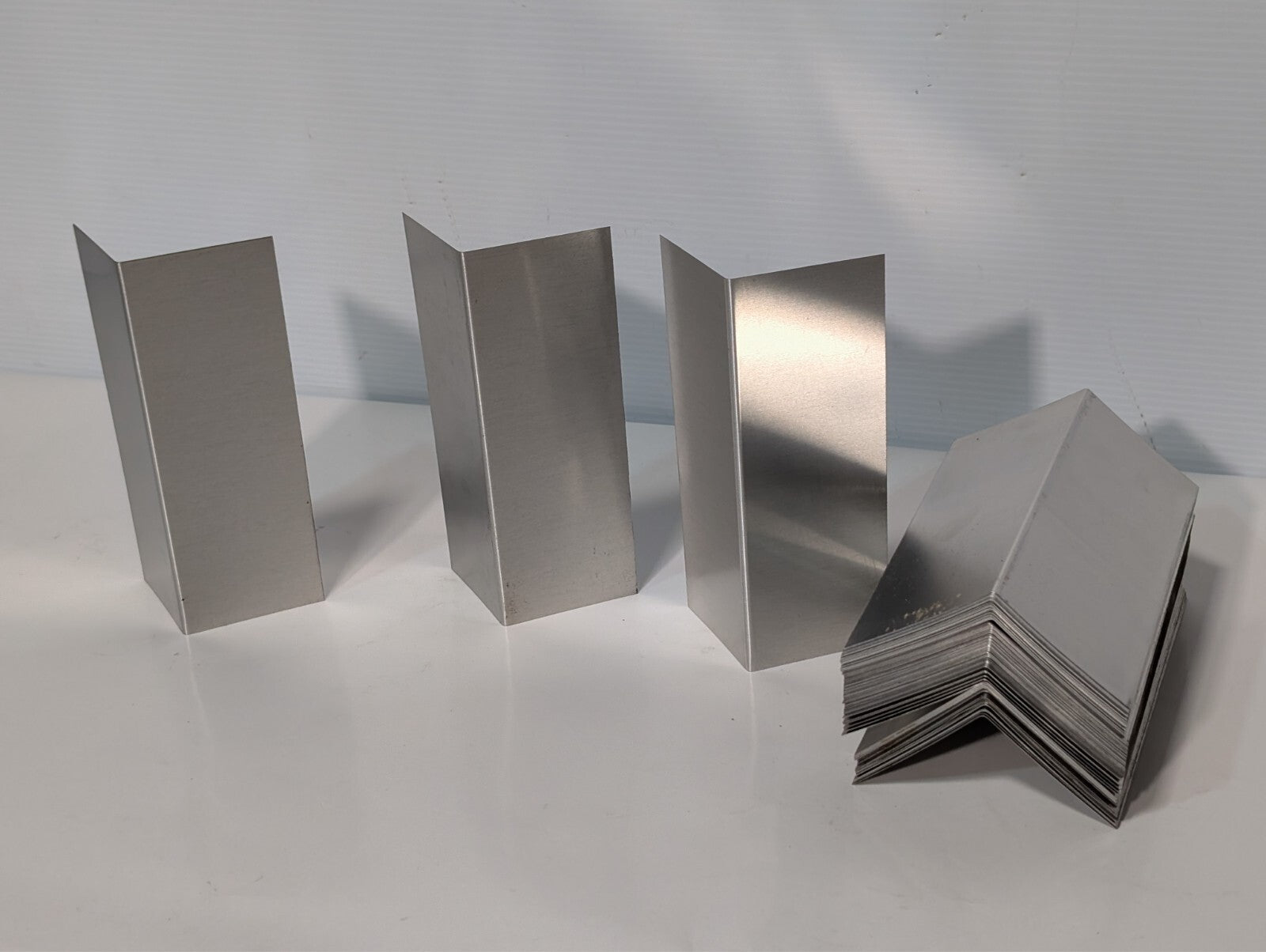 (130) Aluminum 7 inch x 2.5 inch x 2.5 inch bent, for flashing, signs, as shown