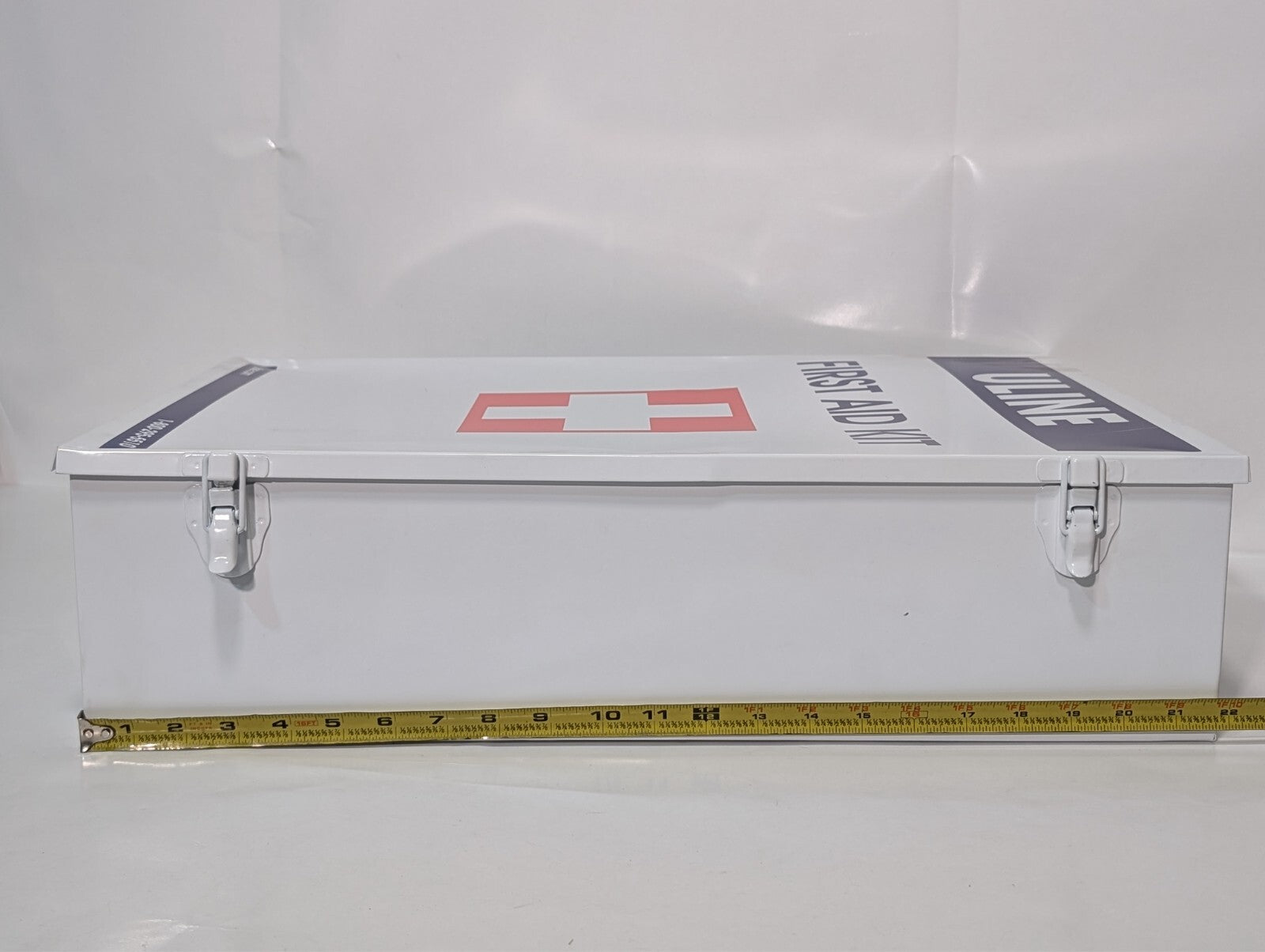 Uline First Aid Cabinet, 4 shelf, metal case, no contents, 22x15x6 inch, dings