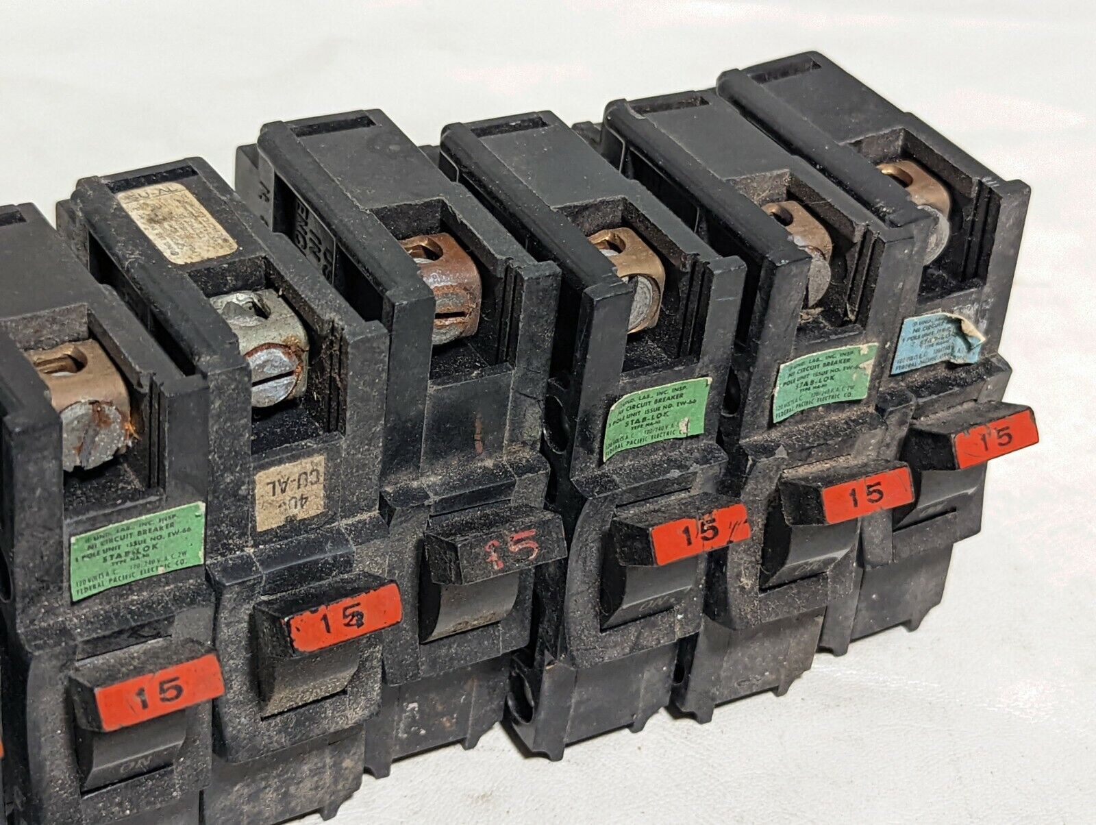 Lot of 11 dirty Federal Pacific NA115 circuit breakers, NA-NI, 15A, 120/240VAC