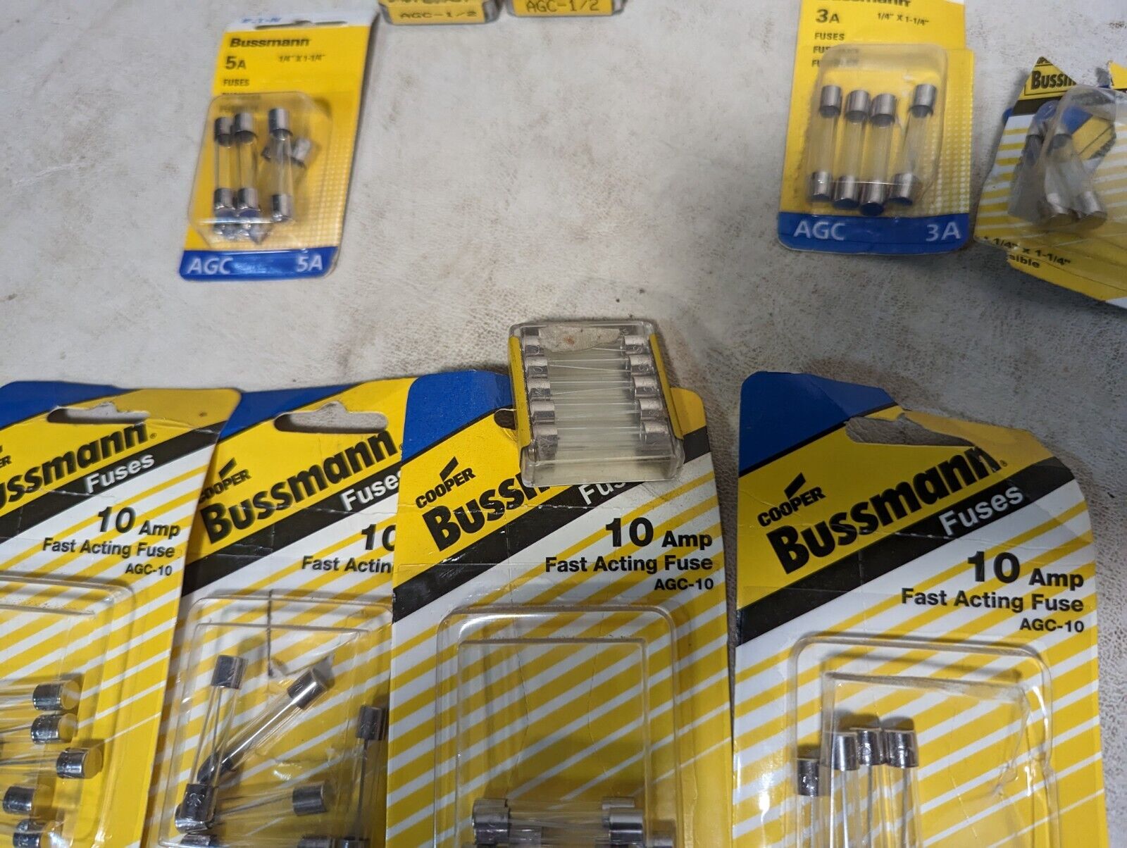 Lot of 100+ fuses: AGC10, AGC15, AGC3, GDB-16A, GMD-3A, 312003P, GMA-500MA, and 