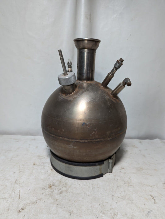 Unbranded stainless steel spherical kettle with stand, has some asphalt inside