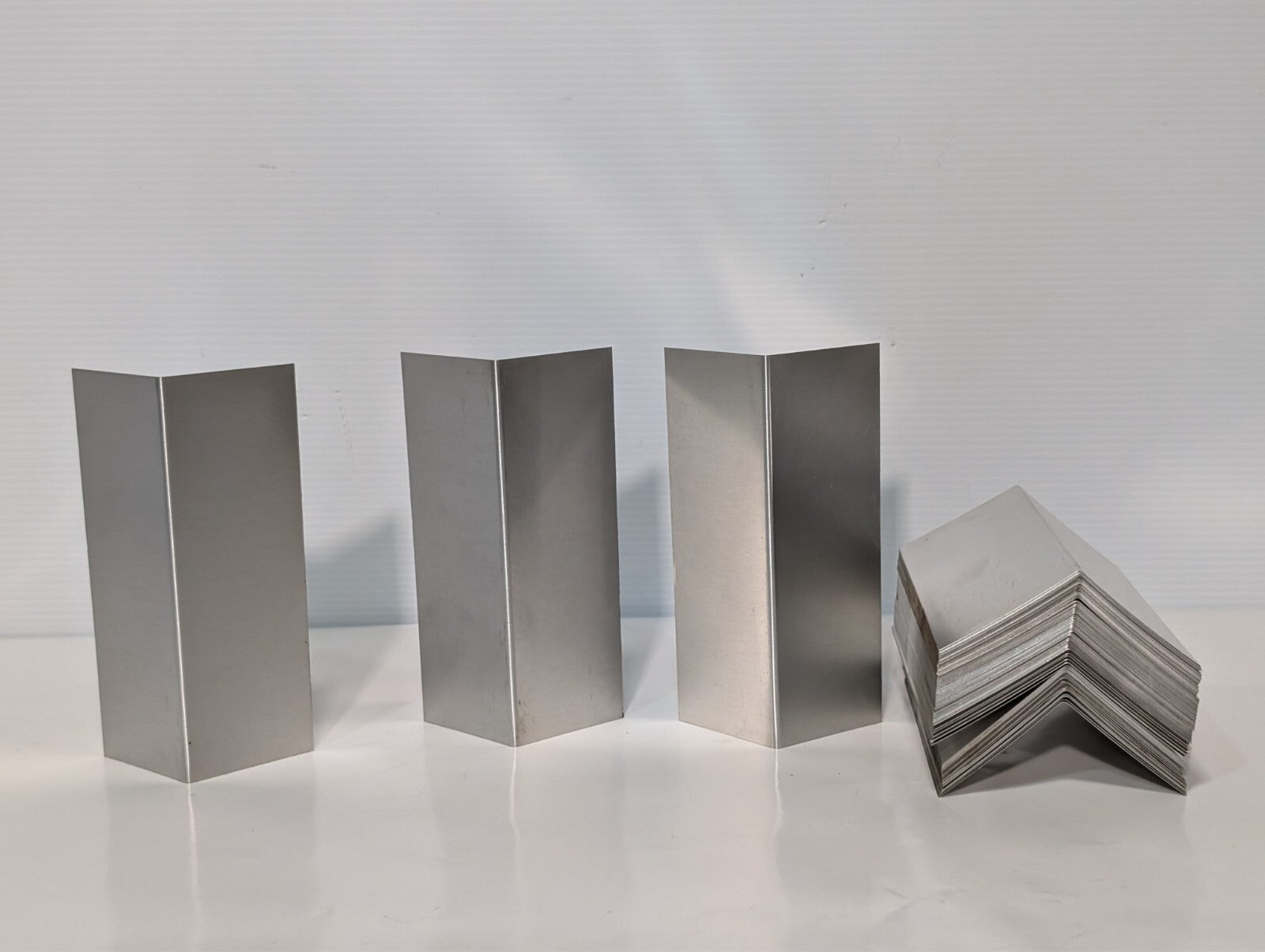 (130) Aluminum 7 inch x 2.5 inch x 2.5 inch bent, for flashing, signs, as shown