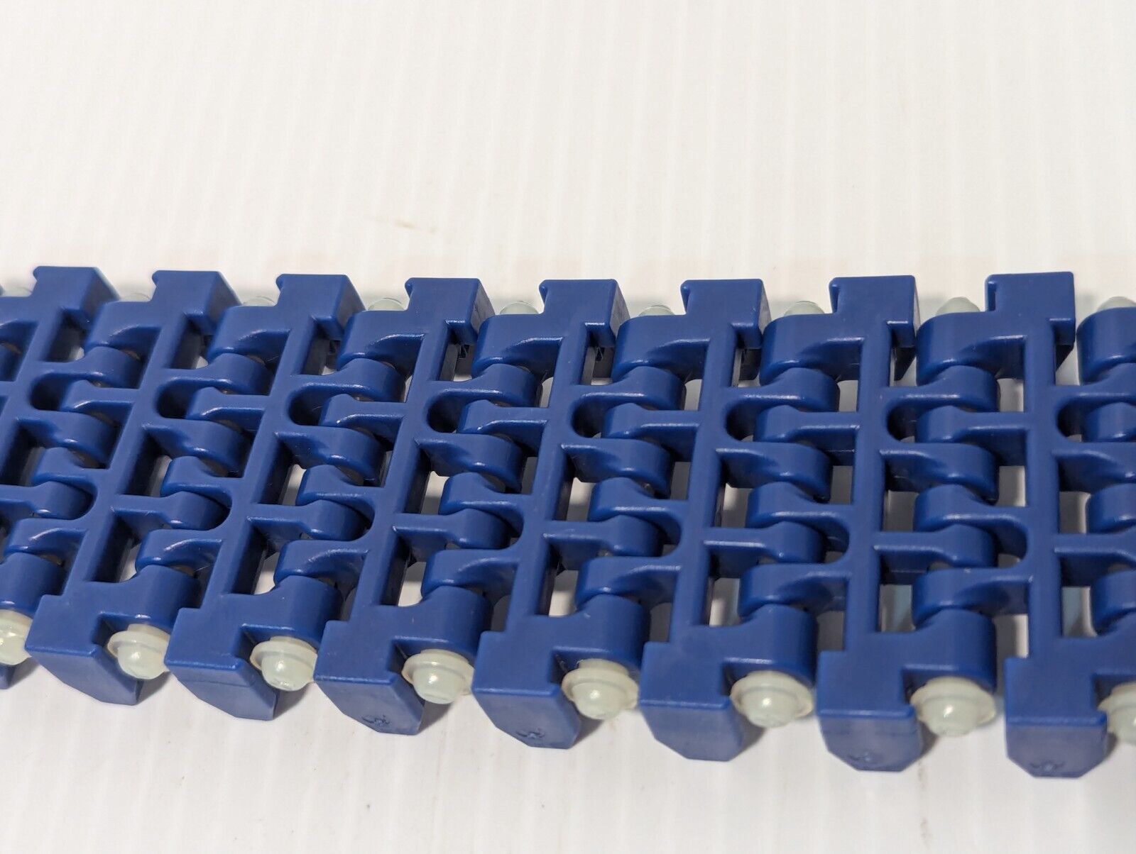 Intralox ser. 1100 acetal/nylon belt, 1.8 inches wide, 2.70 ft long, 54 rows