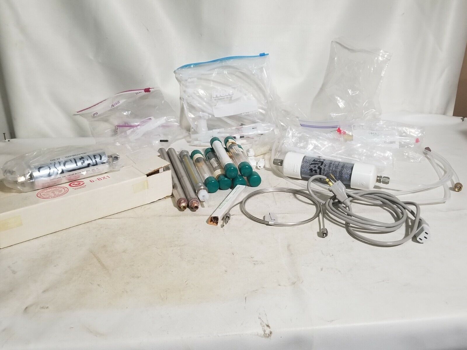 Lot of Oxiclear Disposable Gas Purifier Model DGP-250-R1 and assorted equipment