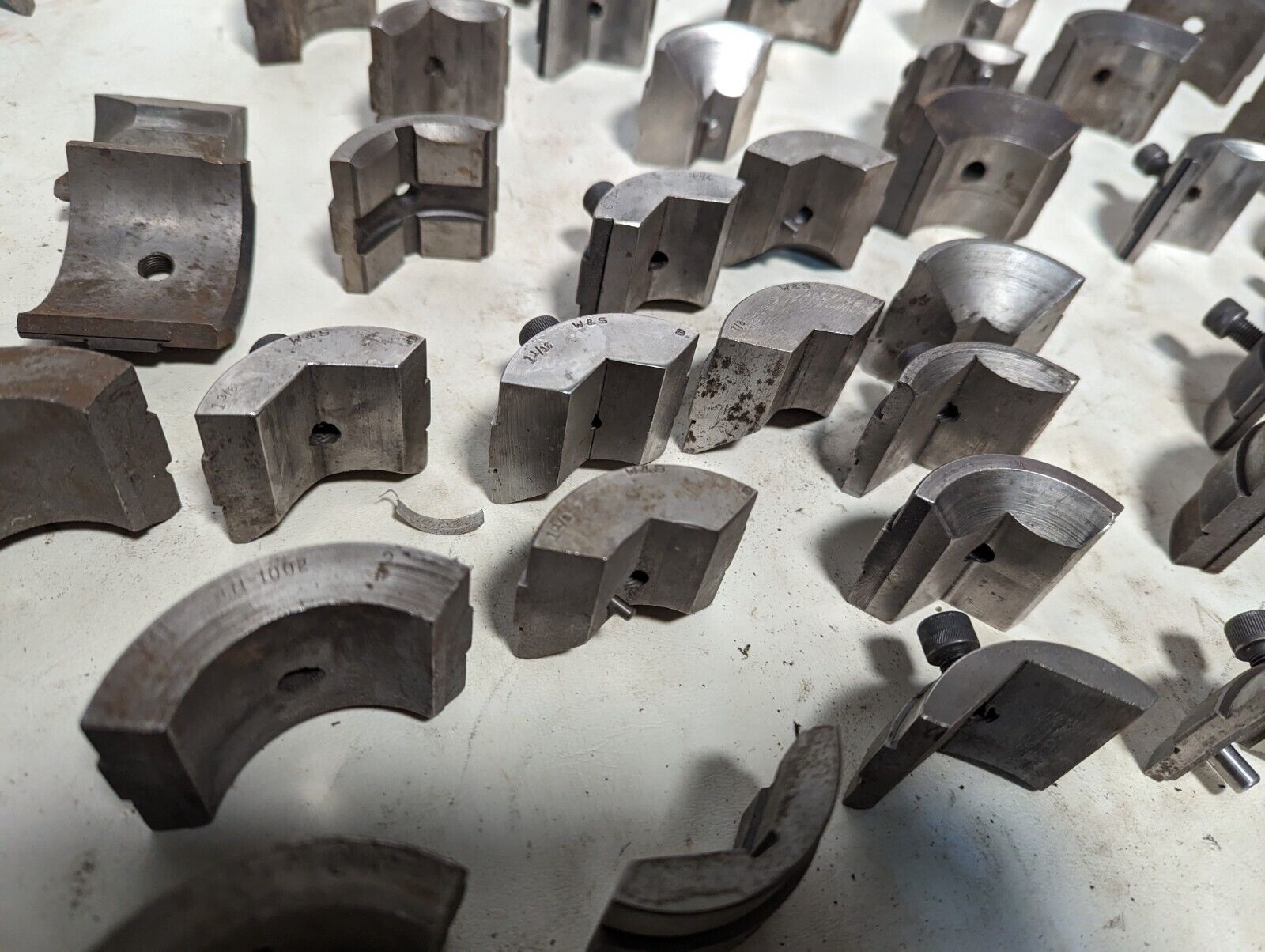 Lot of collet pads as pictured: some complete sets, some incomplete
