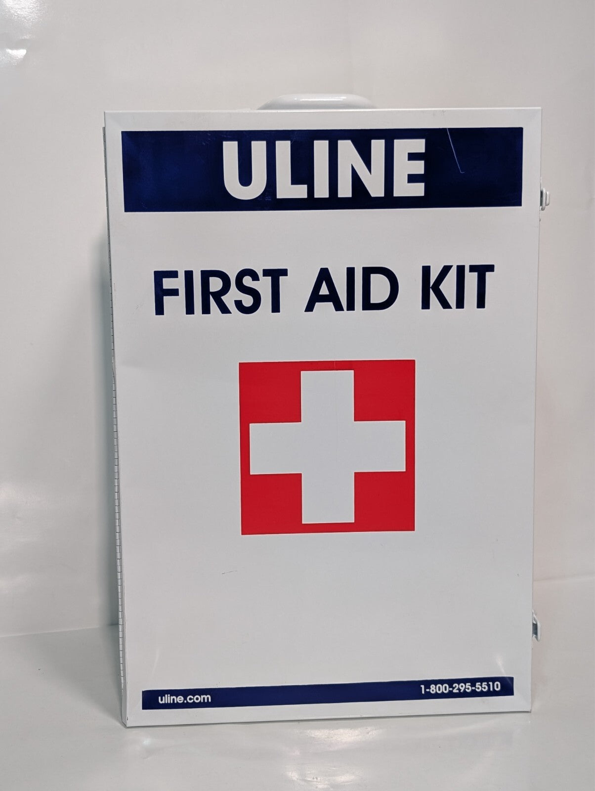 Uline First Aid Cabinet, 4 shelf, metal case, no contents, 22x15x6 inch, dings