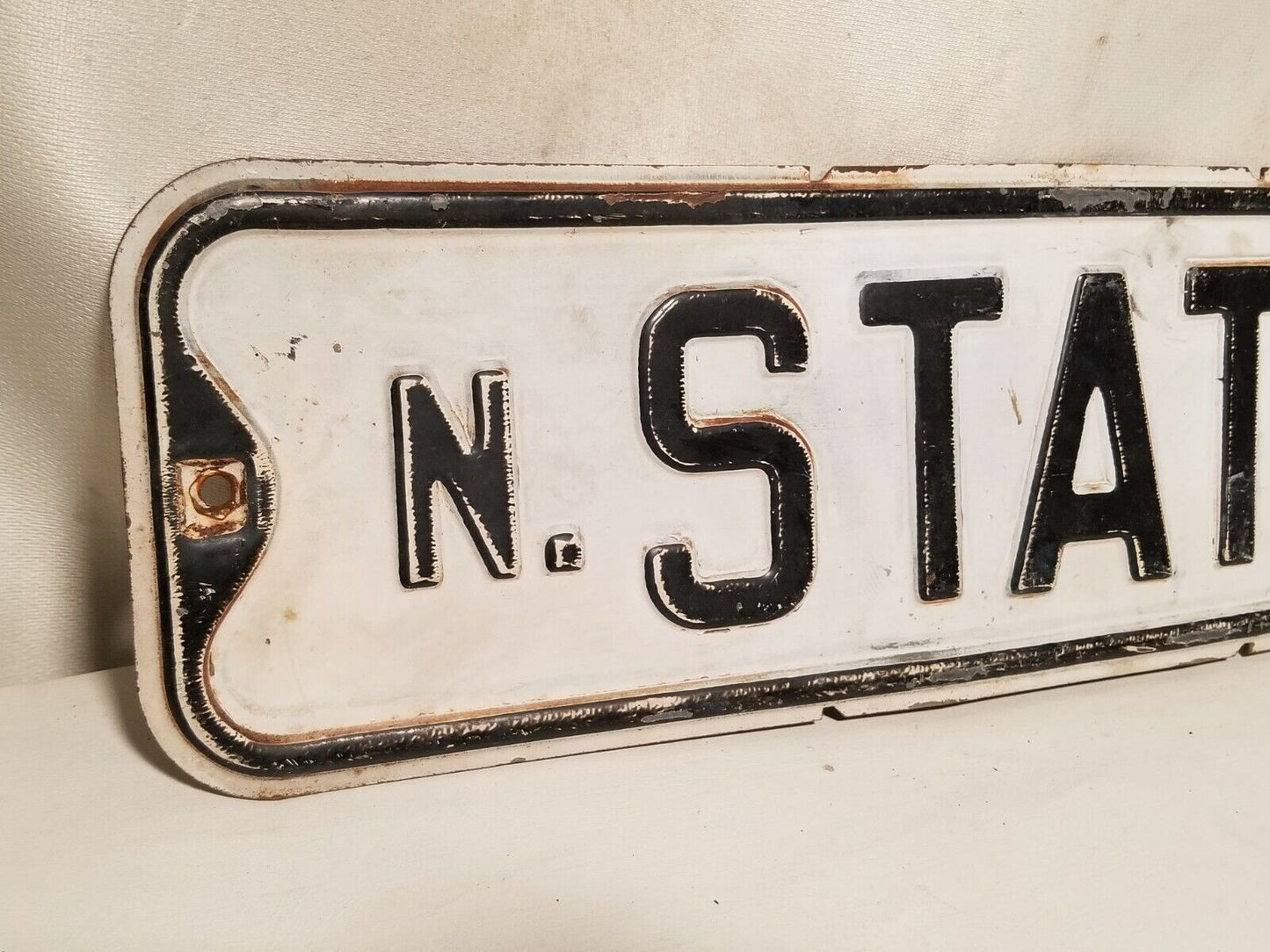 State Street Sign, North State, black and white, some rust, embossed
