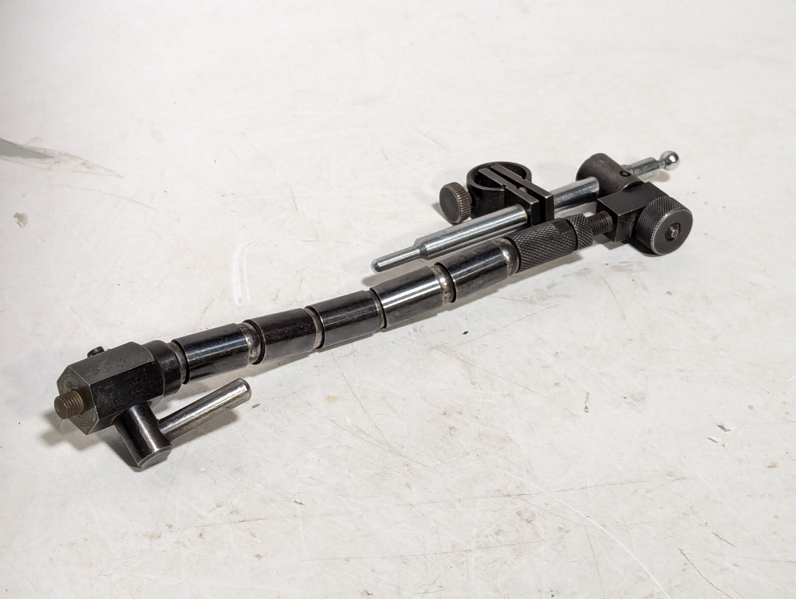 Vintage articulating arm, 6 joints, 5.5 inches long, with mounts as shown