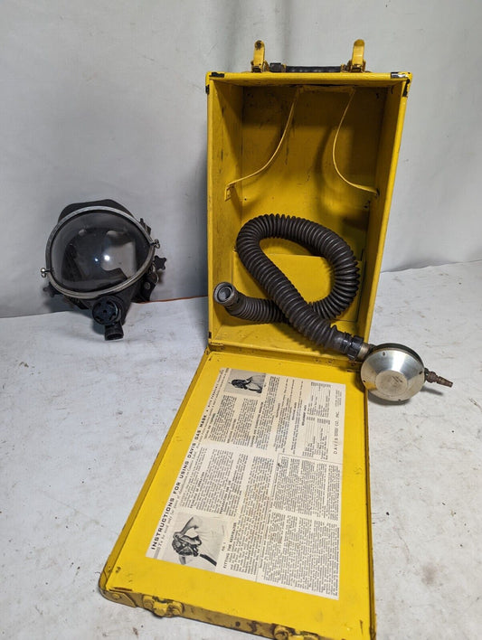 Vintage Davis permissible gas mask in yellow case as pictured