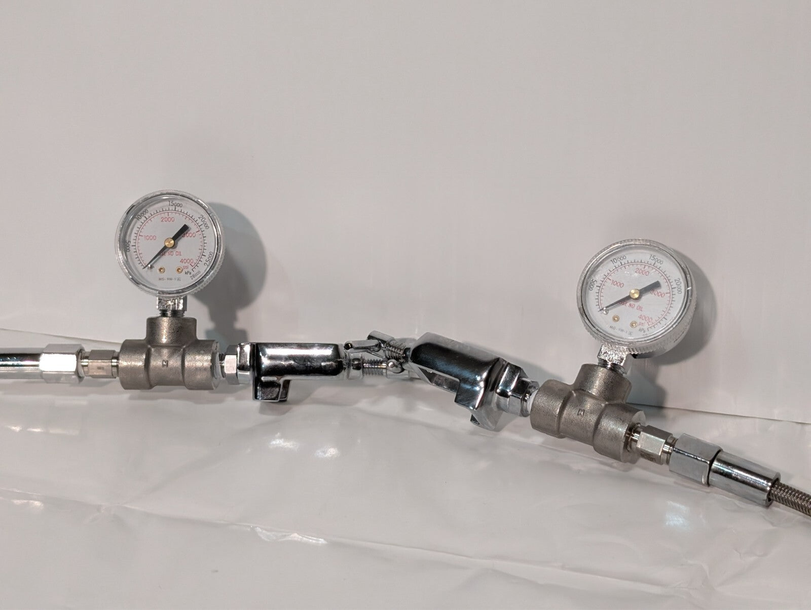 2 Western Medical MG-9W-1 Pressure Gauges on Metal Gas Pipe Cable