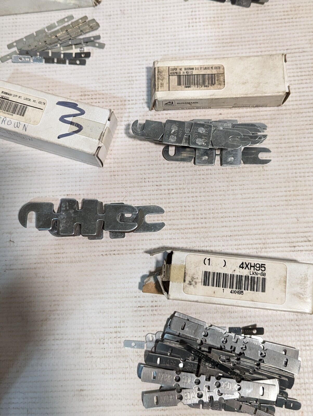 Large lot of Bussmann renewable fuses and links as pictured, REN3, REN30, REN60