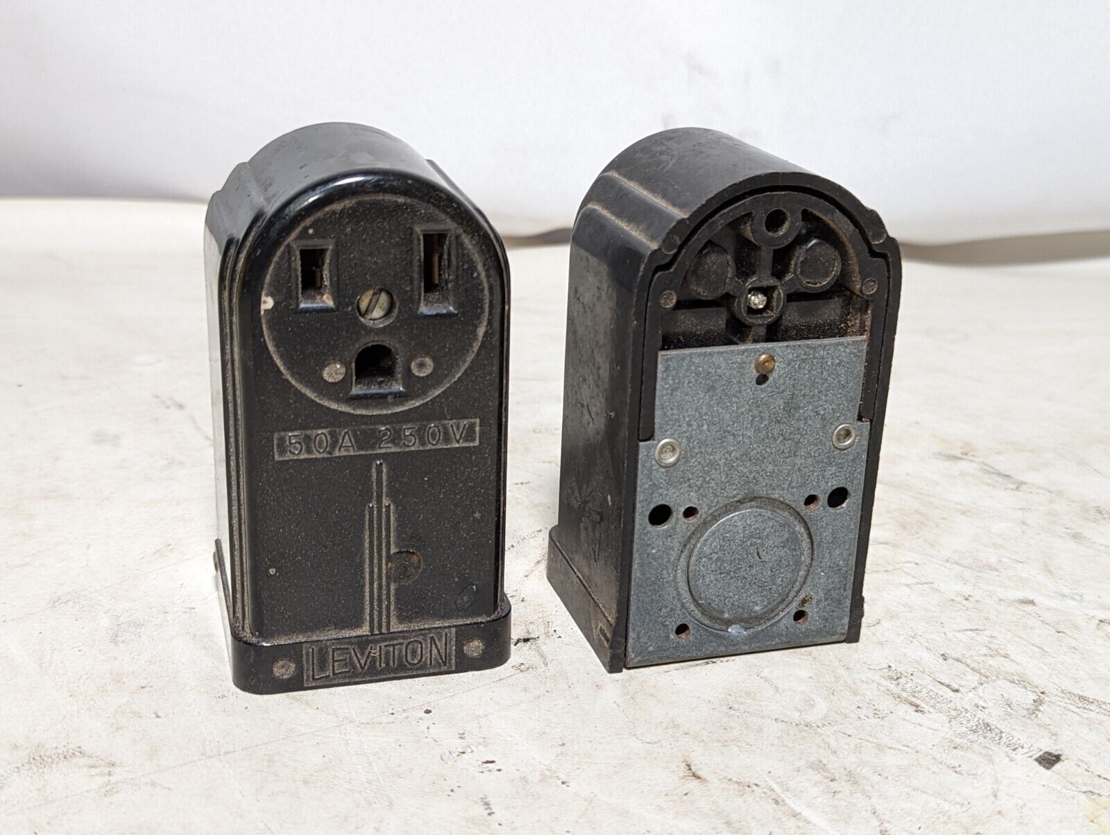 Lot of 2 vintage black Leviton 50A, 250V surface mount receptacles as pictured