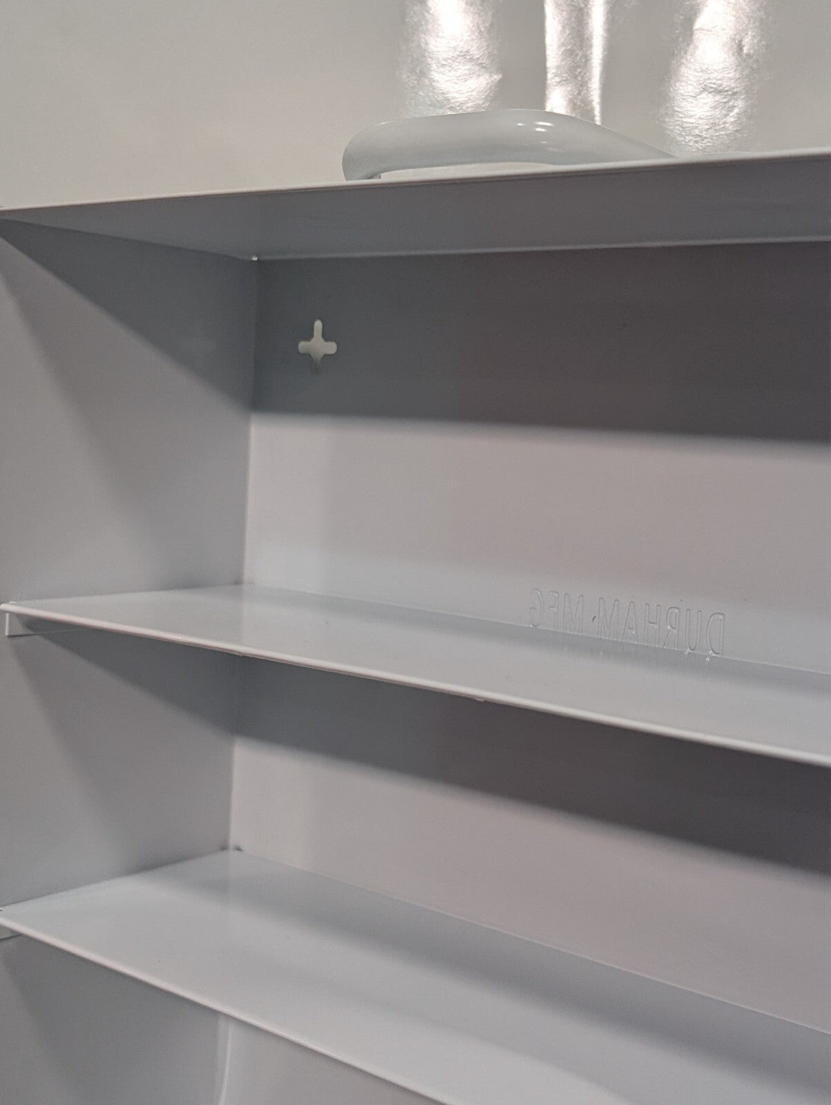 Uline First Aid Cabinet, 4 shelf, metal case, no contents, 22x15x6 inch, dings