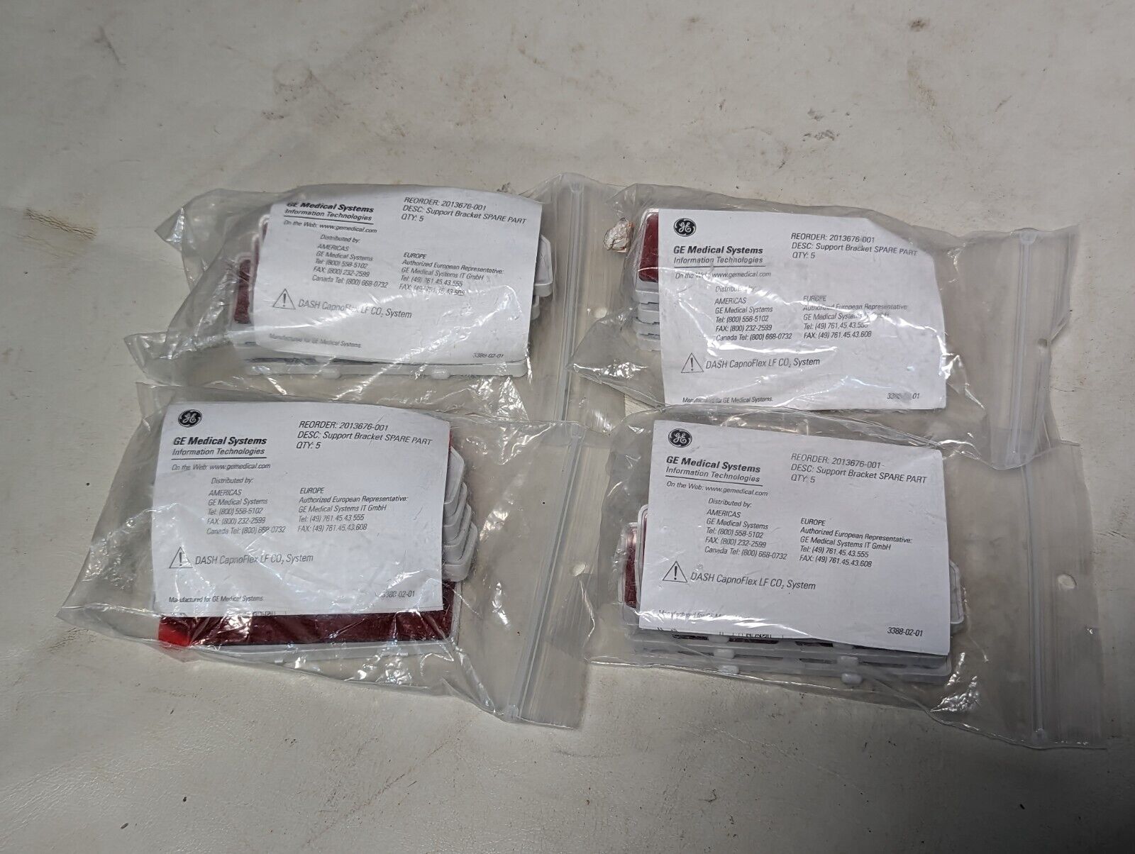 Lot of 19 GE 2013676-001 support brackets spare part